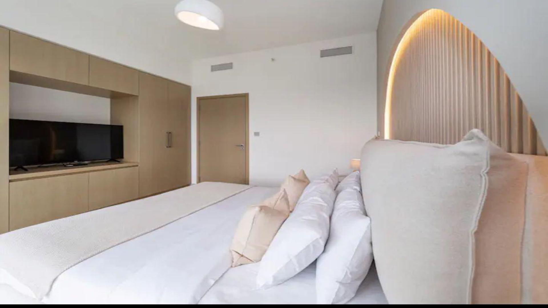 Modern living room in Burj Royale apartment, Downtown Dubai, featuring sleek furniture and decor