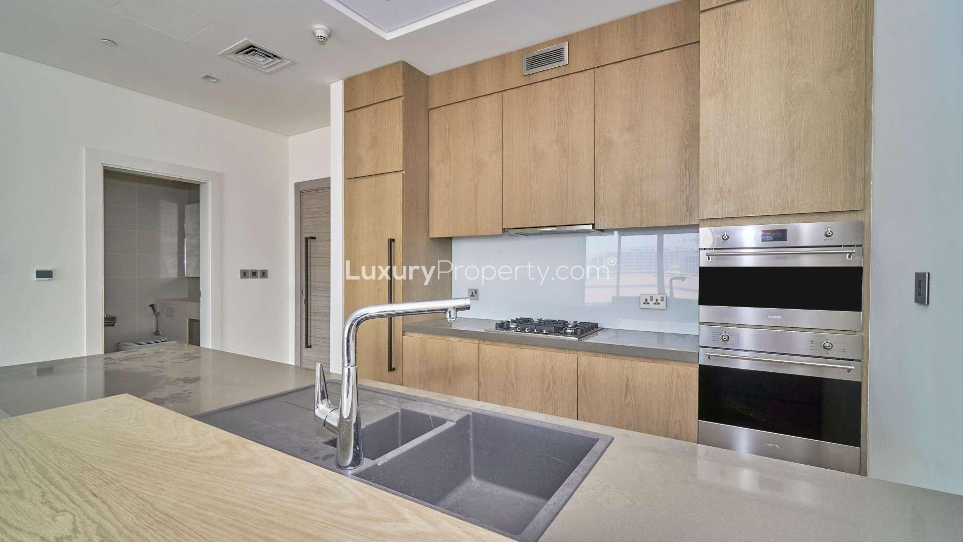 Luxurious apartment balcony view, Serenia Residences, Palm Jumeirah, overlooking tennis courts and sea