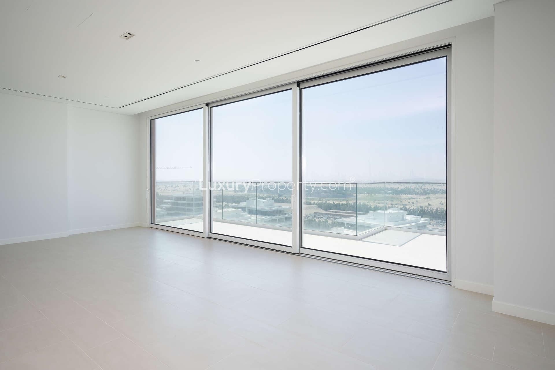 Modern kitchen and spacious living area in Seventh Heaven, Al Barari apartment for rent