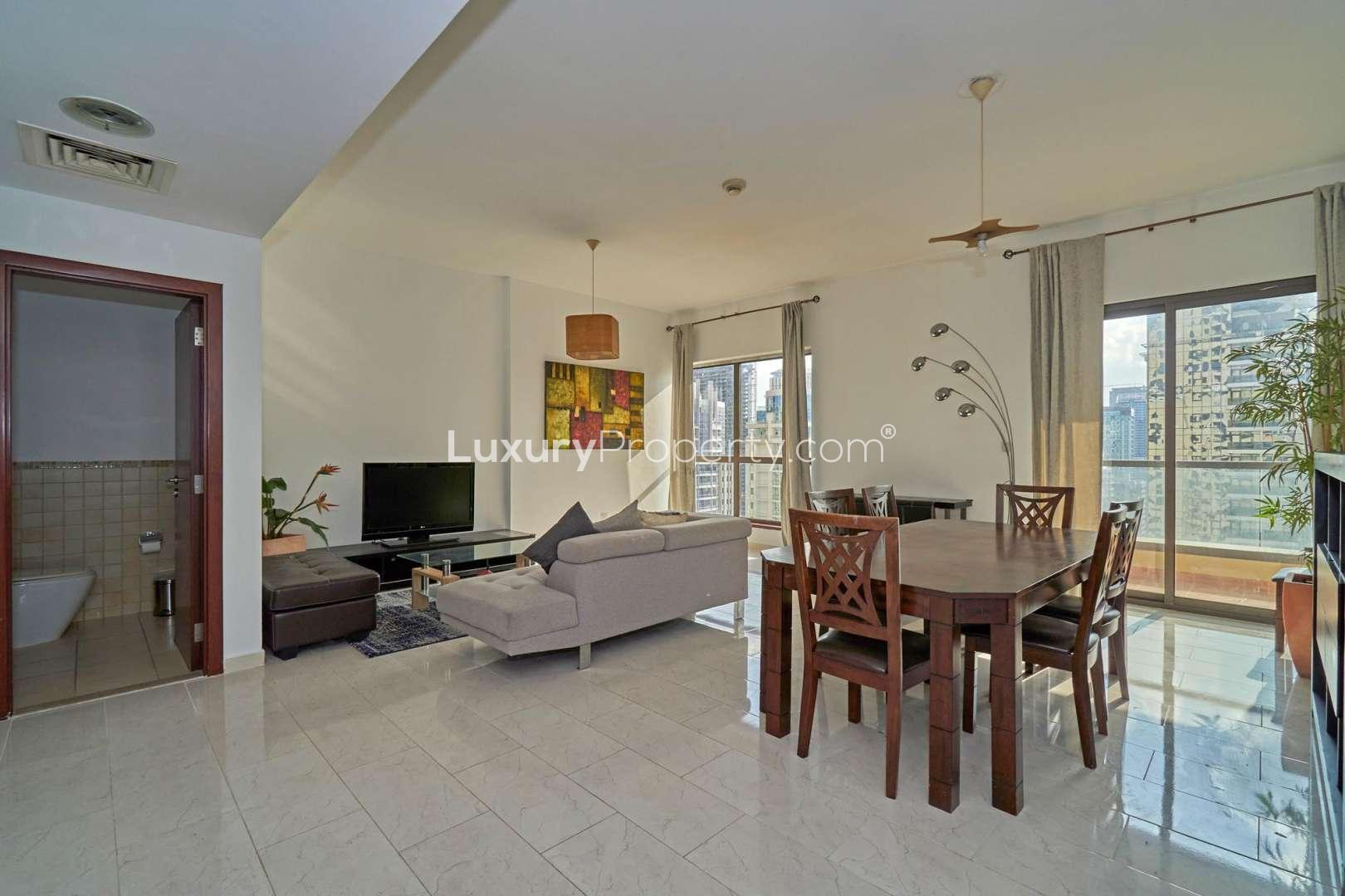 Two-bedroom apartment interior at Shams, JBR, featuring stylish decor and twin beds