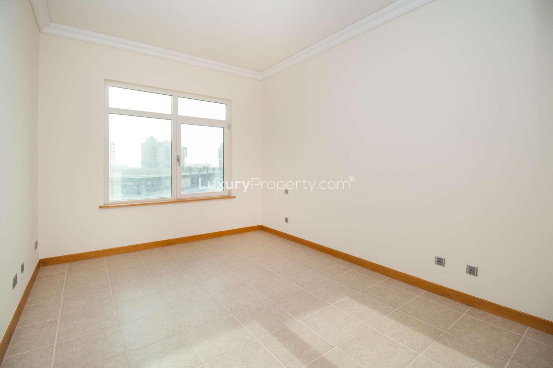 Balcony view from Shoreline Residences apartment in Palm Jumeirah, overlooking modern architecture