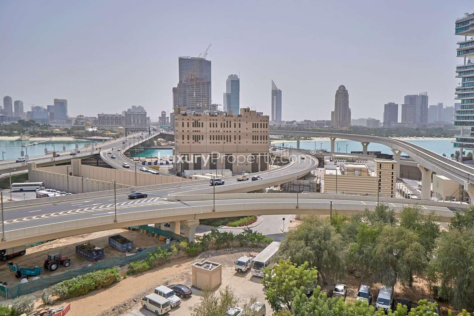 Bedroom in Shoreline Residences apartment, Palm Jumeirah, with patterned walls and modern decor