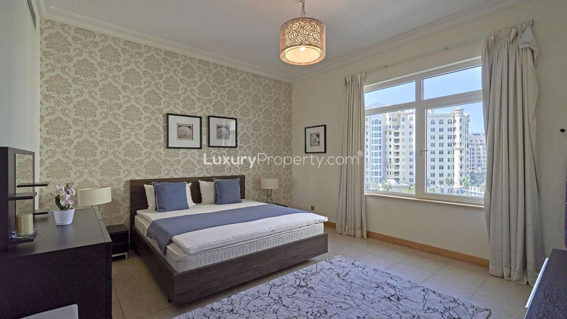 Balcony view from two-bedroom apartment in Shoreline, Palm Jumeirah, overlooking street and buildings