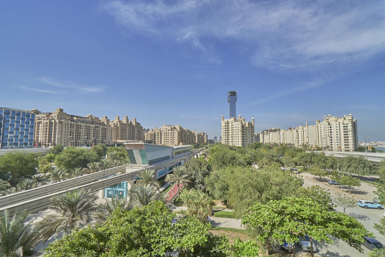 Modern kitchen in 2-bedroom apartment, Shoreline Apartments, Palm Jumeirah, granite countertops, wooden cabinets