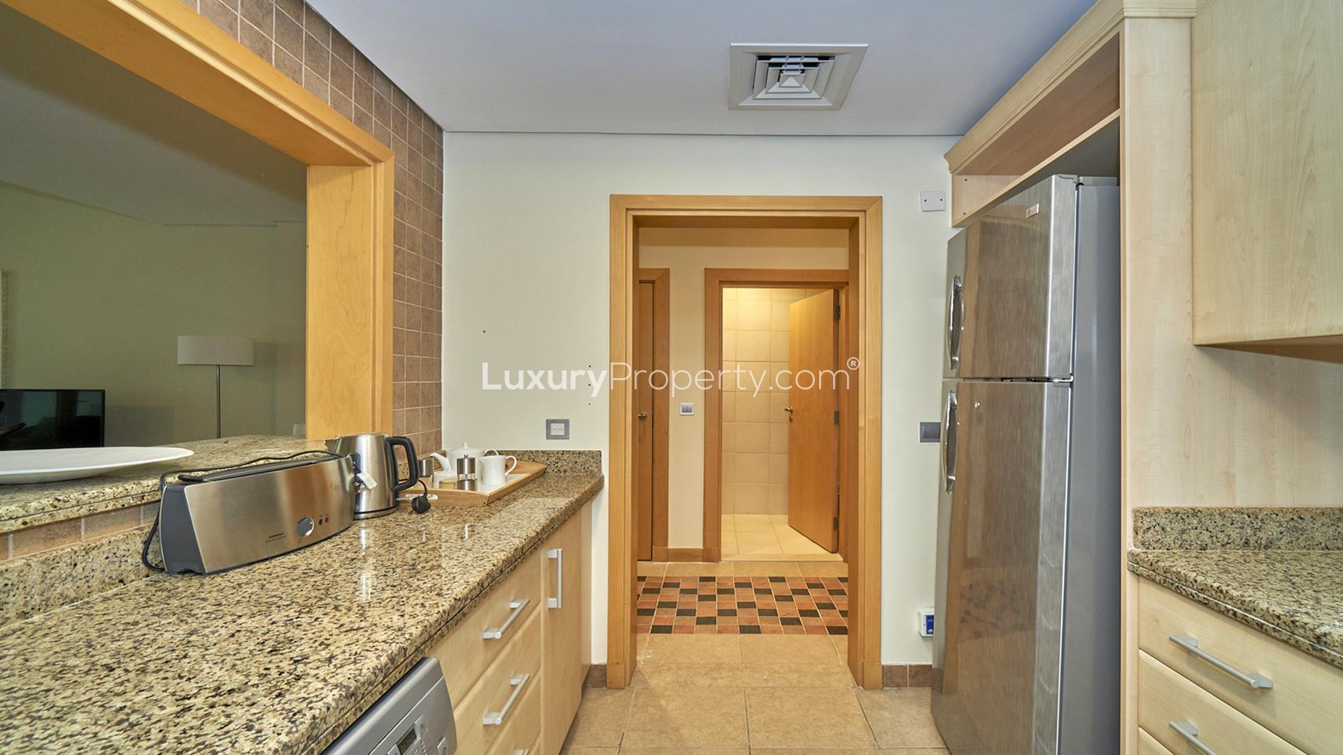 Balcony view from fully furnished apartment in Shoreline Apartments, Palm Jumeirah with cityscape