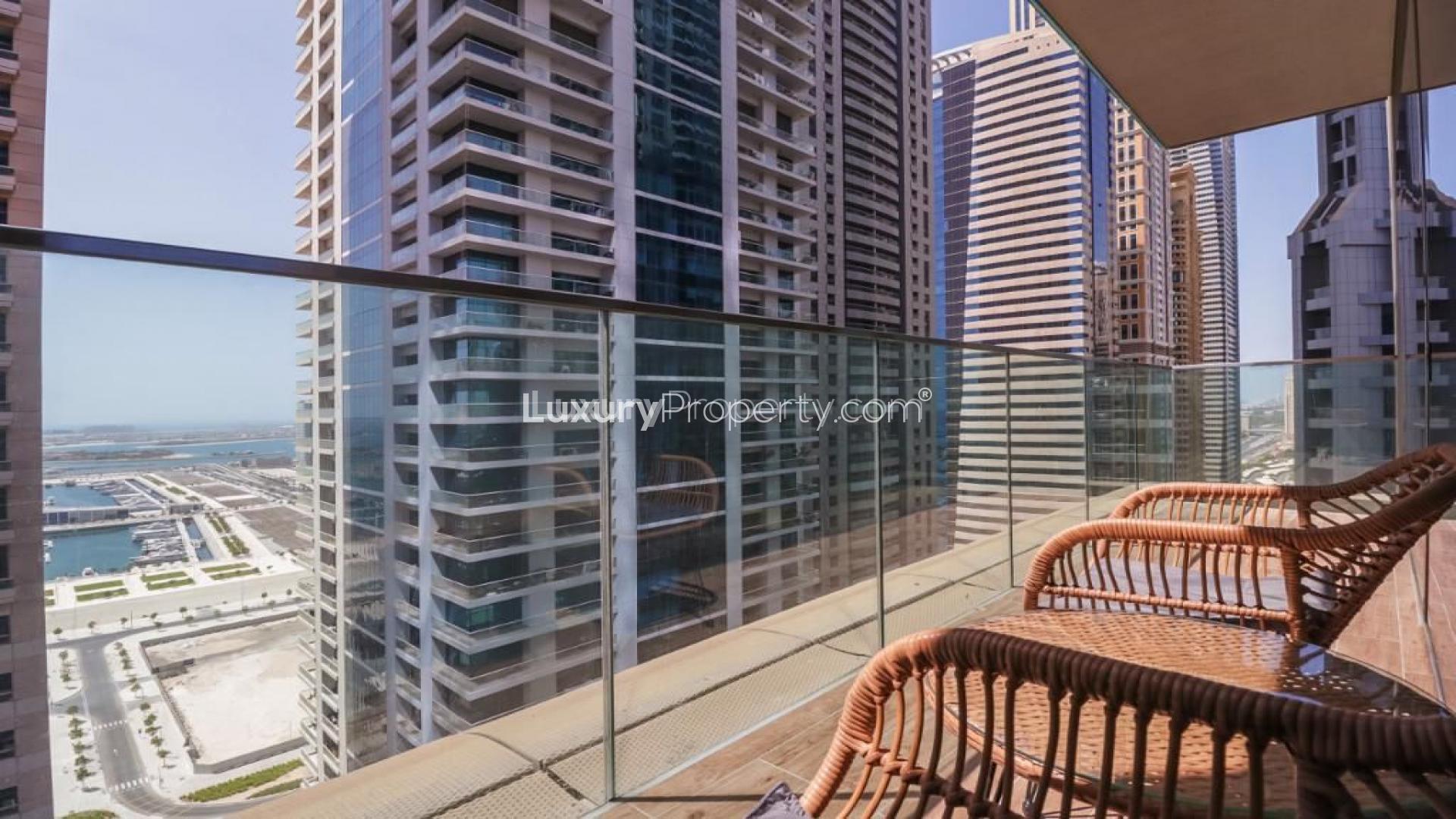 Modern kitchen with bar seating in 2-bed apartment, Marina Gate, Dubai Marina