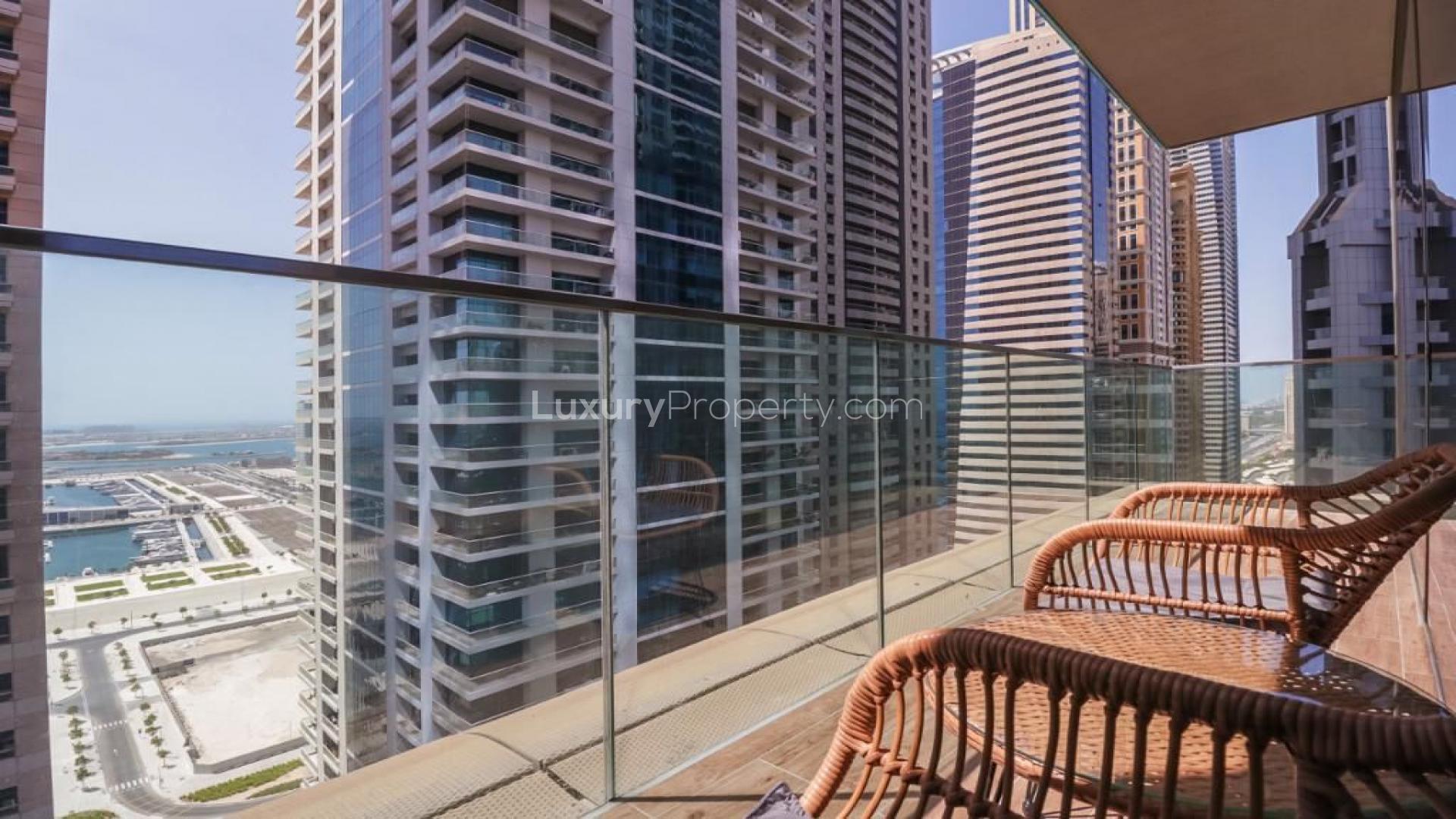 Modern kitchen with bar seating in 2-bed apartment, Marina Gate, Dubai Marina