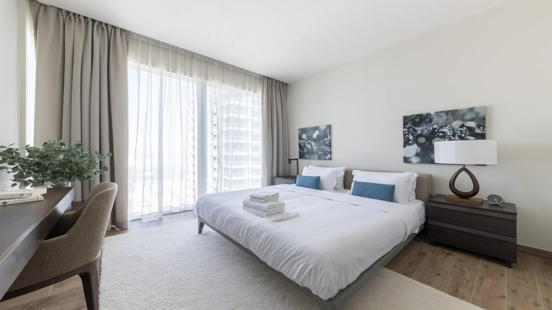 Furnished high-floor apartment living room in Marina Gate, Dubai Marina, with modern decor