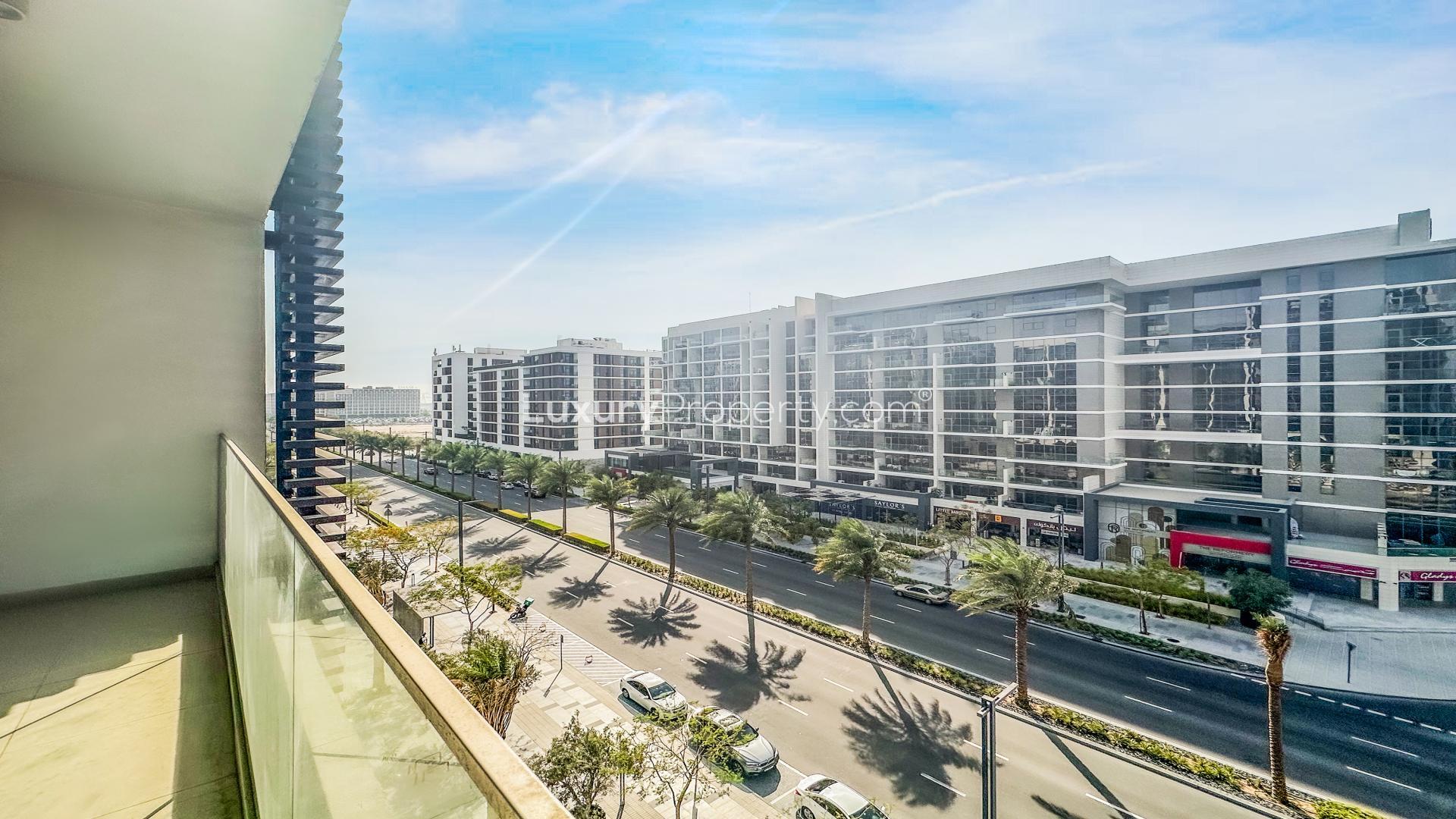 Spacious living room with large windows in Acacia Park Heights apartment, Dubai Hills Estate