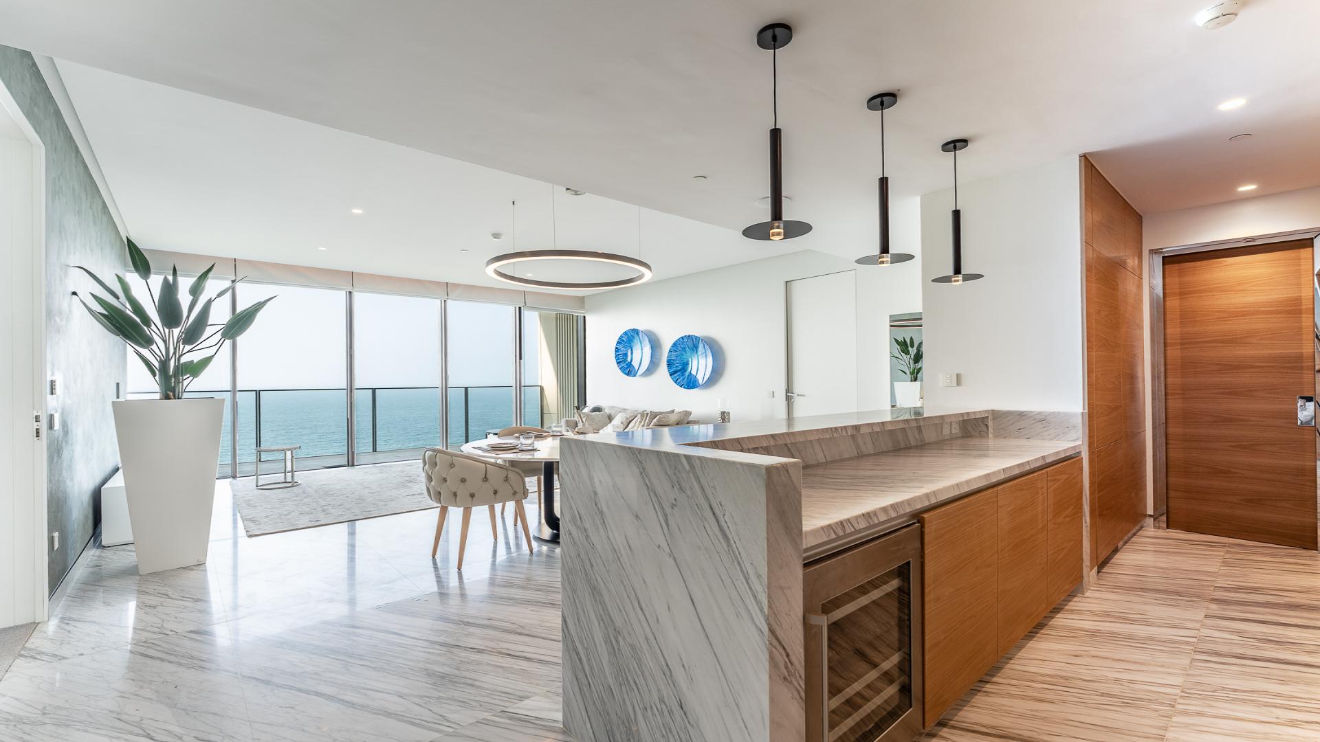 Modern living room in two-bedroom apartment, The Royal Atlantis, Palm Jumeirah, marble flooring