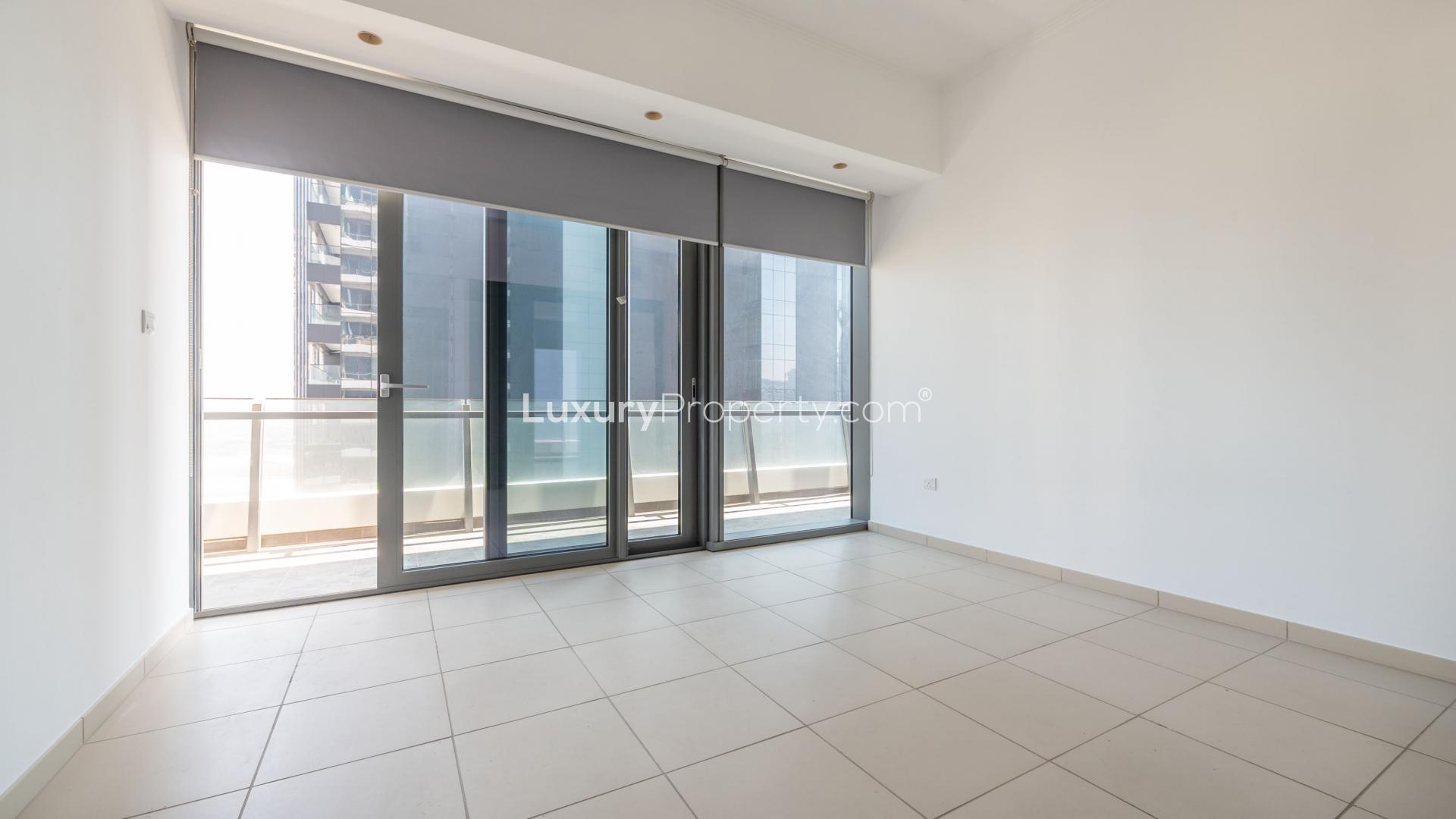 Modern living area in 2-bed apartment, Silverene Tower, Dubai Marina, with bright natural light