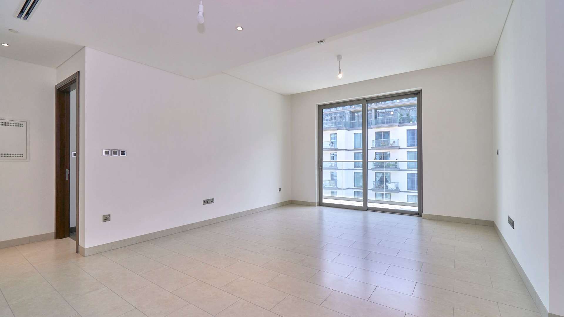 Aerial view of modern apartment complex with pool in Sobha Hartland, Mohammed Bin Rashid City