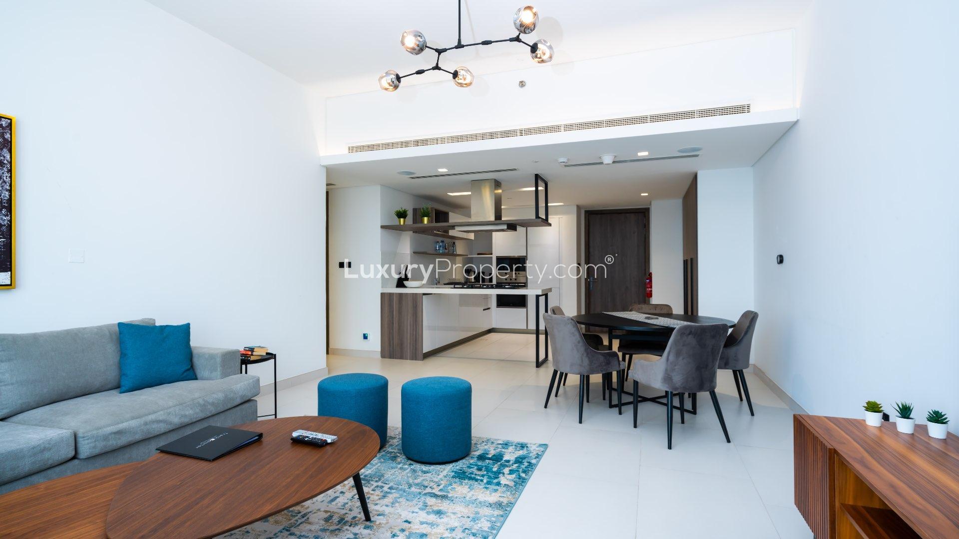 Modern living room in 2-bedroom penthouse, Soho Palm Jumeirah, with stylish furniture and decor