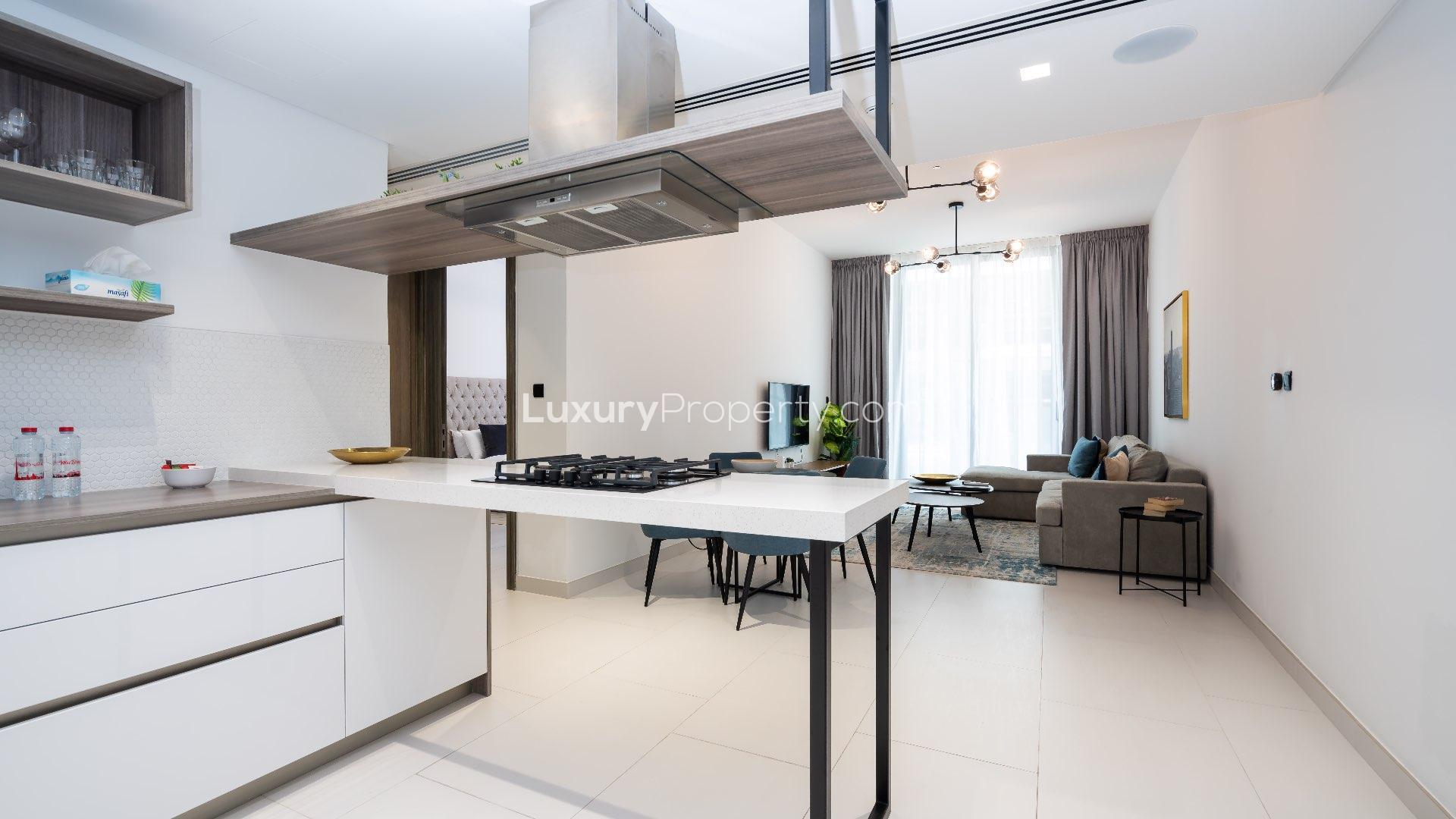 Modern living room and kitchen in 2-bedroom junior penthouse, Palm Jumeirah apartment for rent