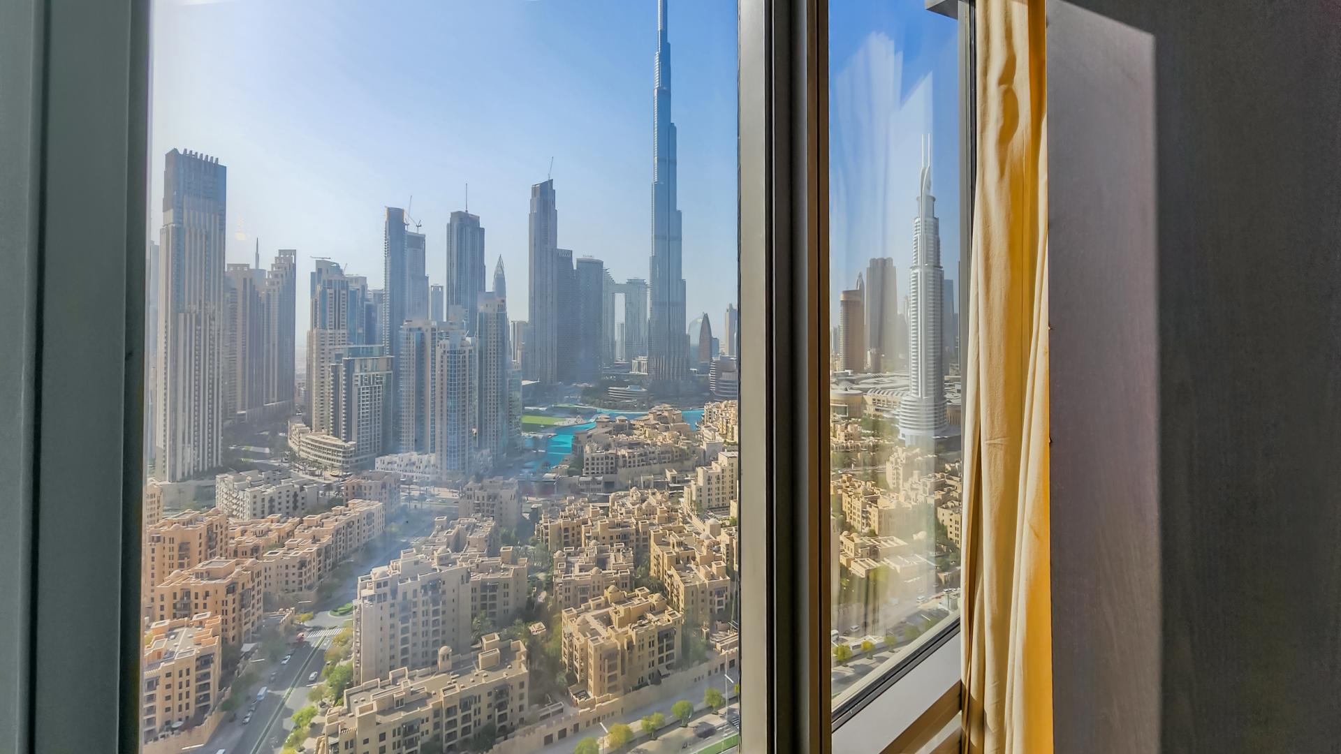 Bright, spacious living area in high-floor South Ridge apartment, Downtown Dubai, for rent