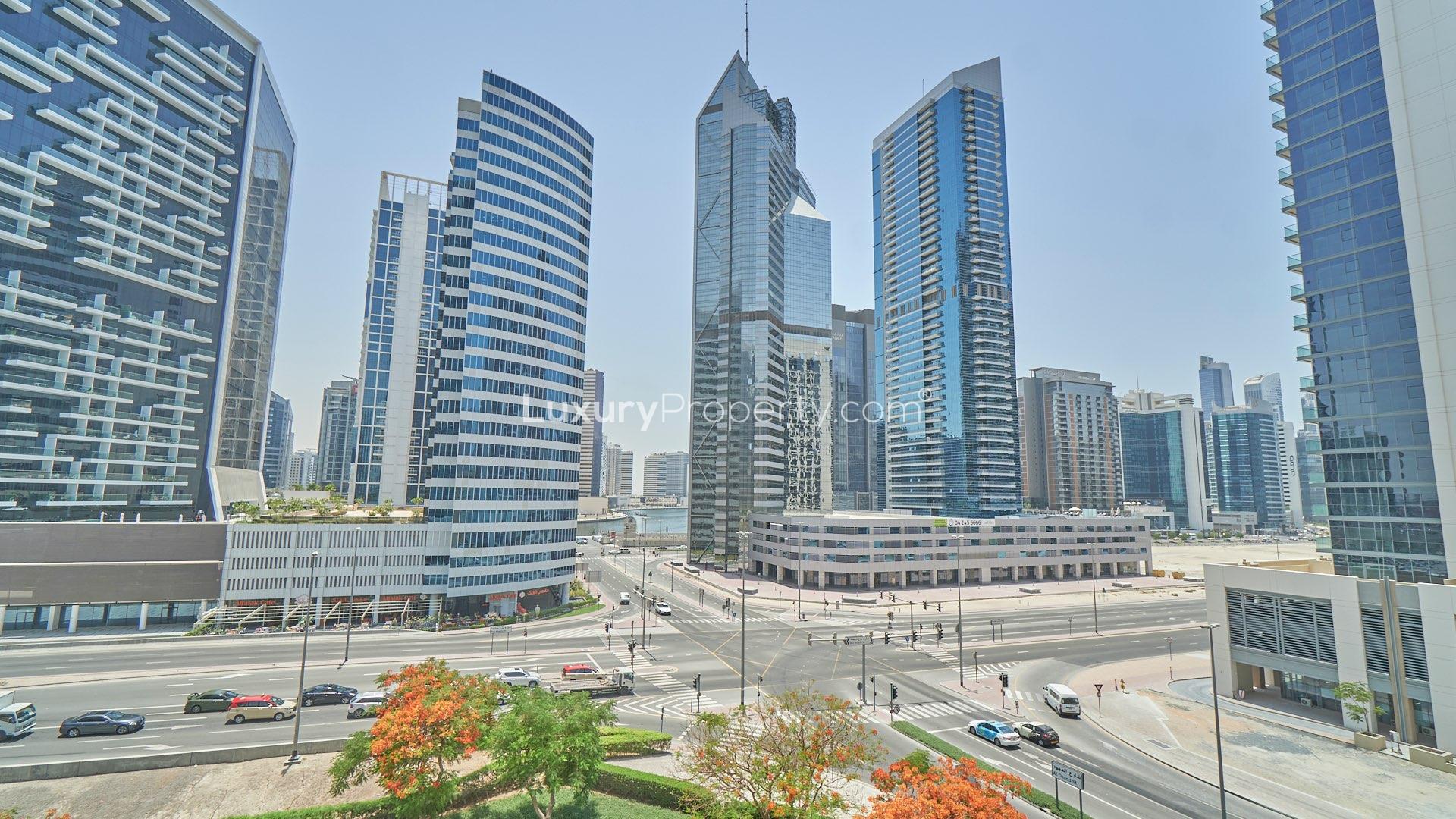 Spacious living room with large windows in South Ridge apartment, Downtown Dubai