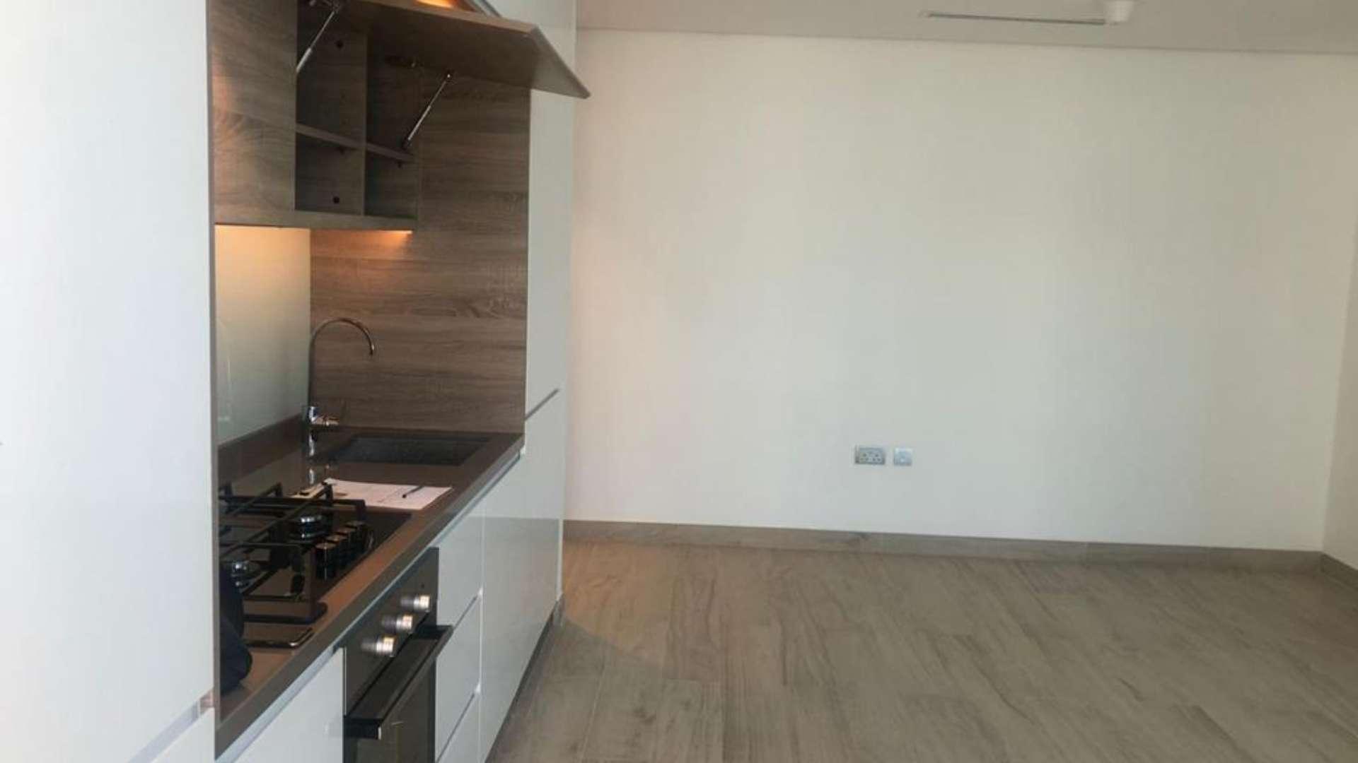 Luxury 2-bedroom apartment interior with floor-to-ceiling windows in Studio One, Dubai Marina