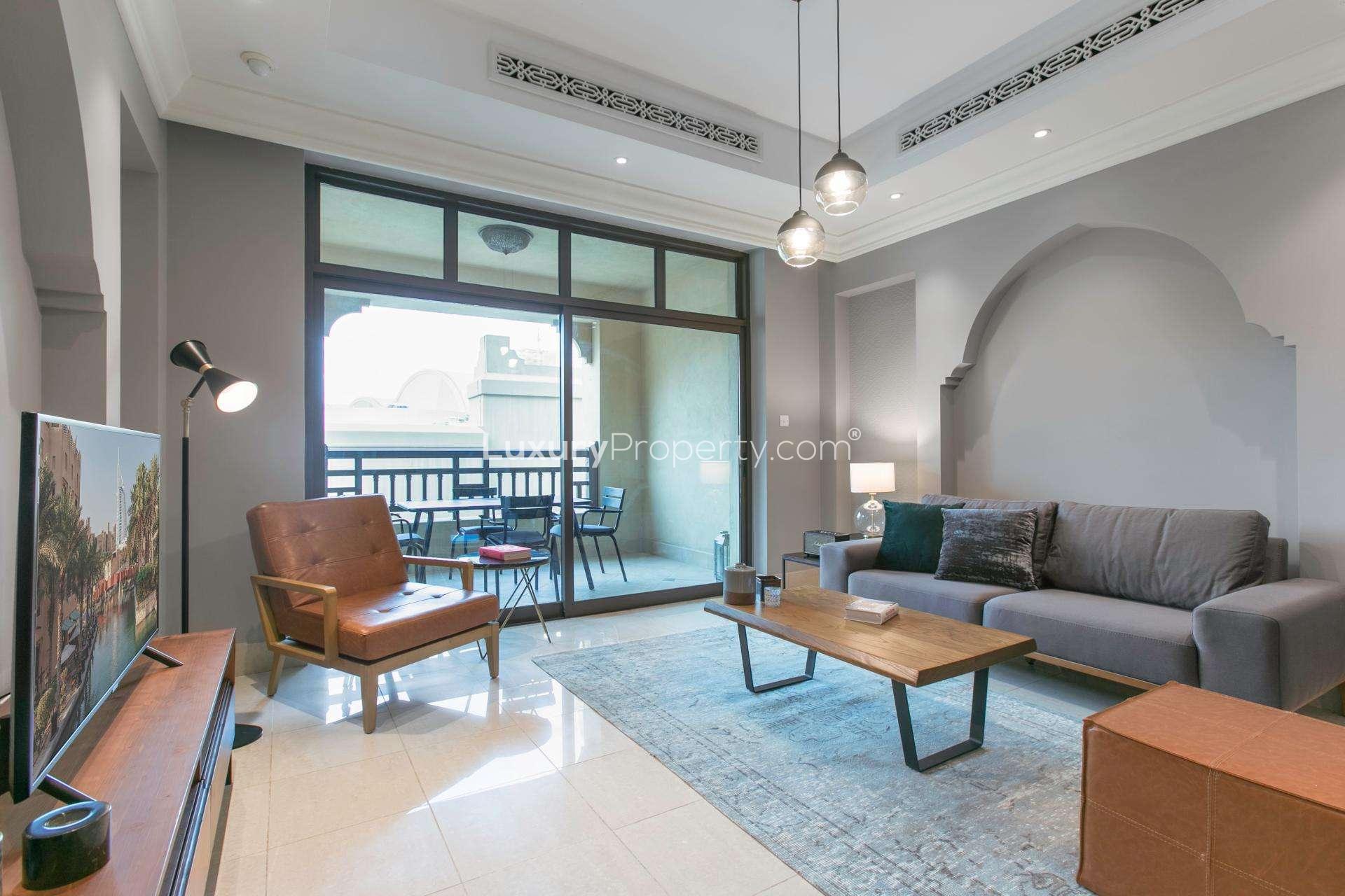 Modern bathroom sink with mirror in Old Town Island apartment for rent