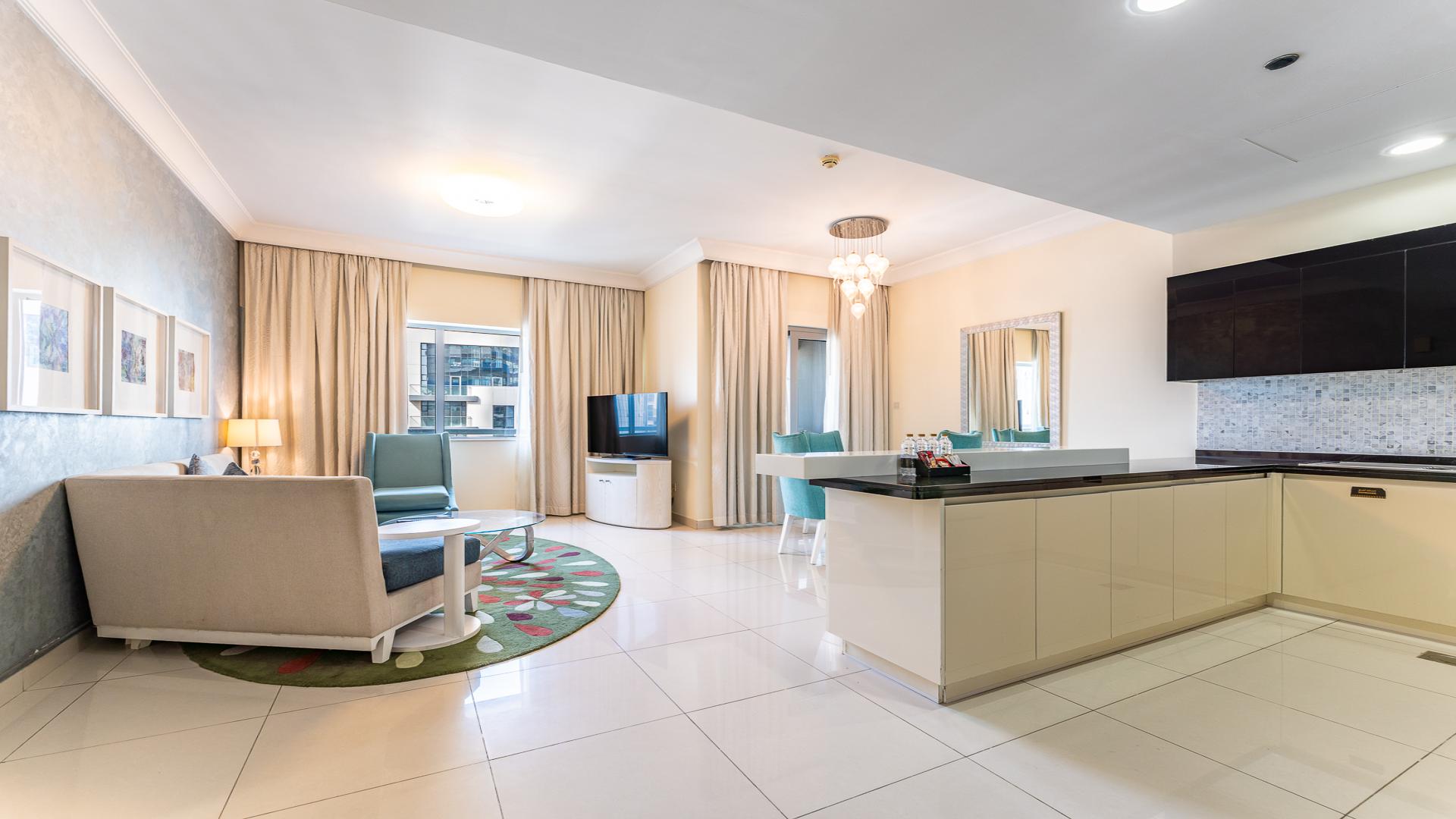 Modern living room and kitchen in The Signature, Downtown Dubai apartment for rent, LP49071