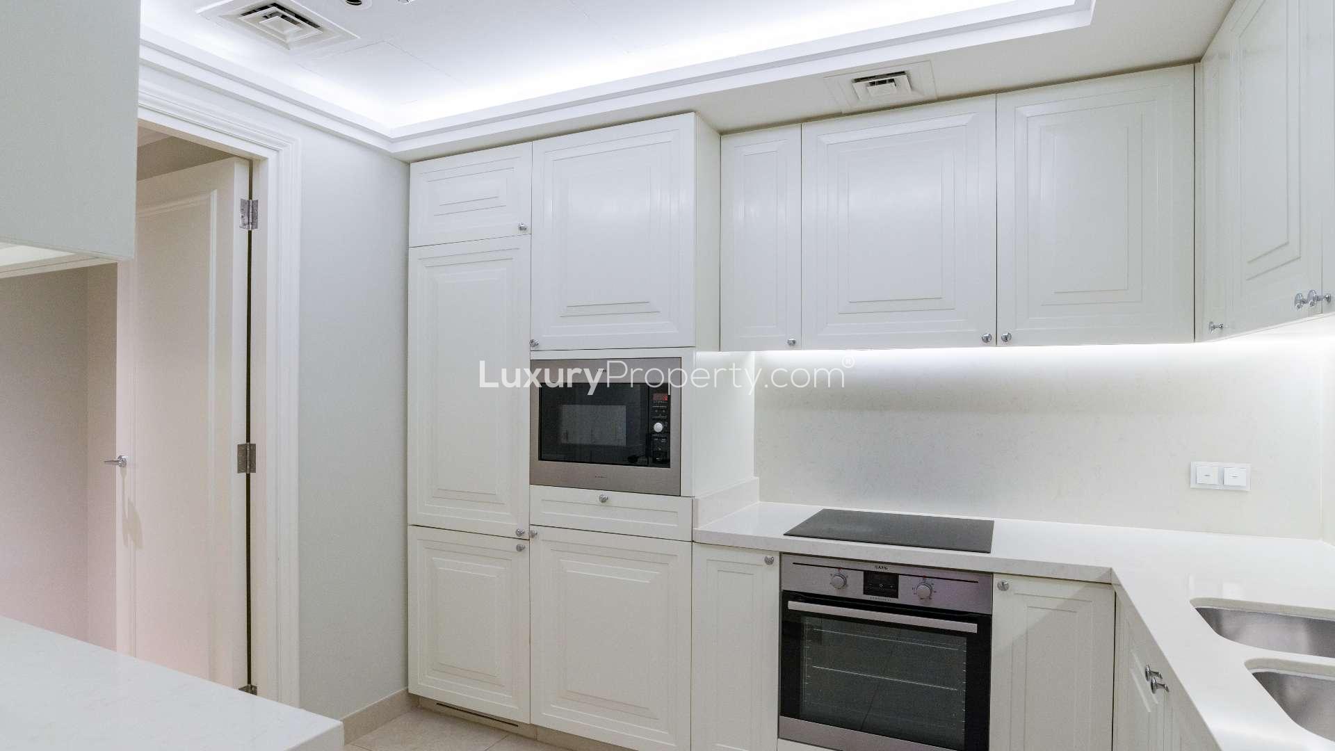 "Stunning Downtown Dubai skyline view from The Address Boulevard apartment balcony, featuring Burj Khalifa.",High-end apartment balcony view of Downtown Dubai skyline, The Address BLVD Sky Collection