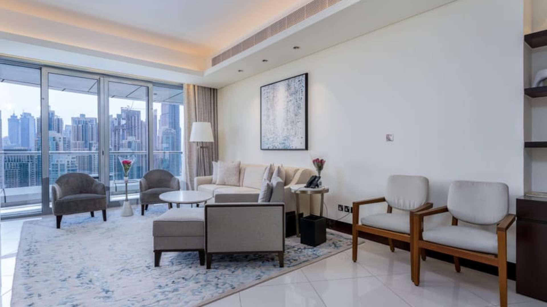 Balcony view from 2-bedroom apartment in The Address Downtown, overlooking Dubai skyline and Burj Lake