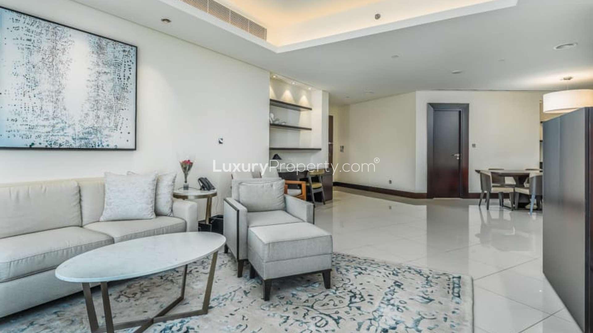 Luxurious living room in 2-bedroom apartment, The Address Downtown, with city skyline view