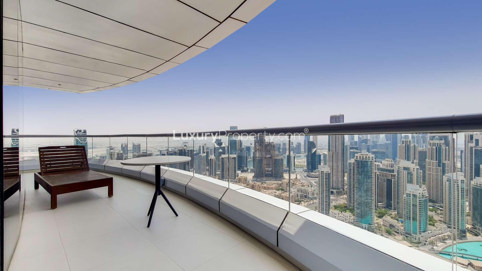 Spacious living room in serviced apartment, The Address Downtown, with city view, modern furnishings