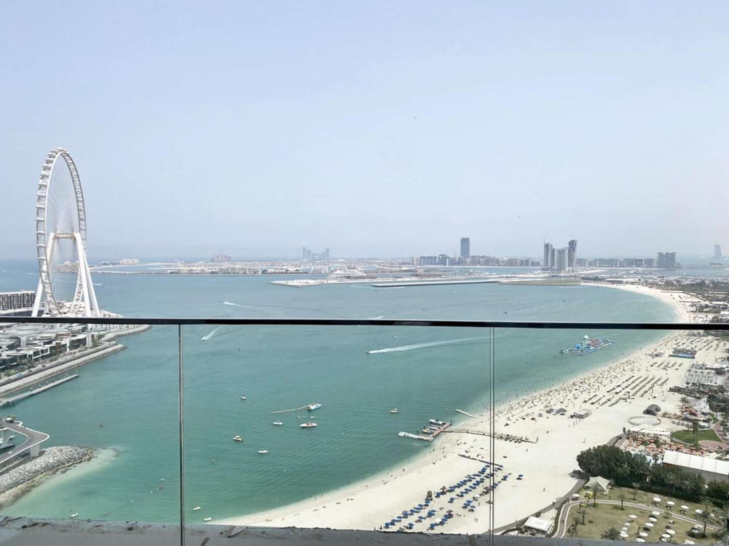 Interior view of JBR apartment with balcony overlooking ocean at The Address Jumeirah Resort