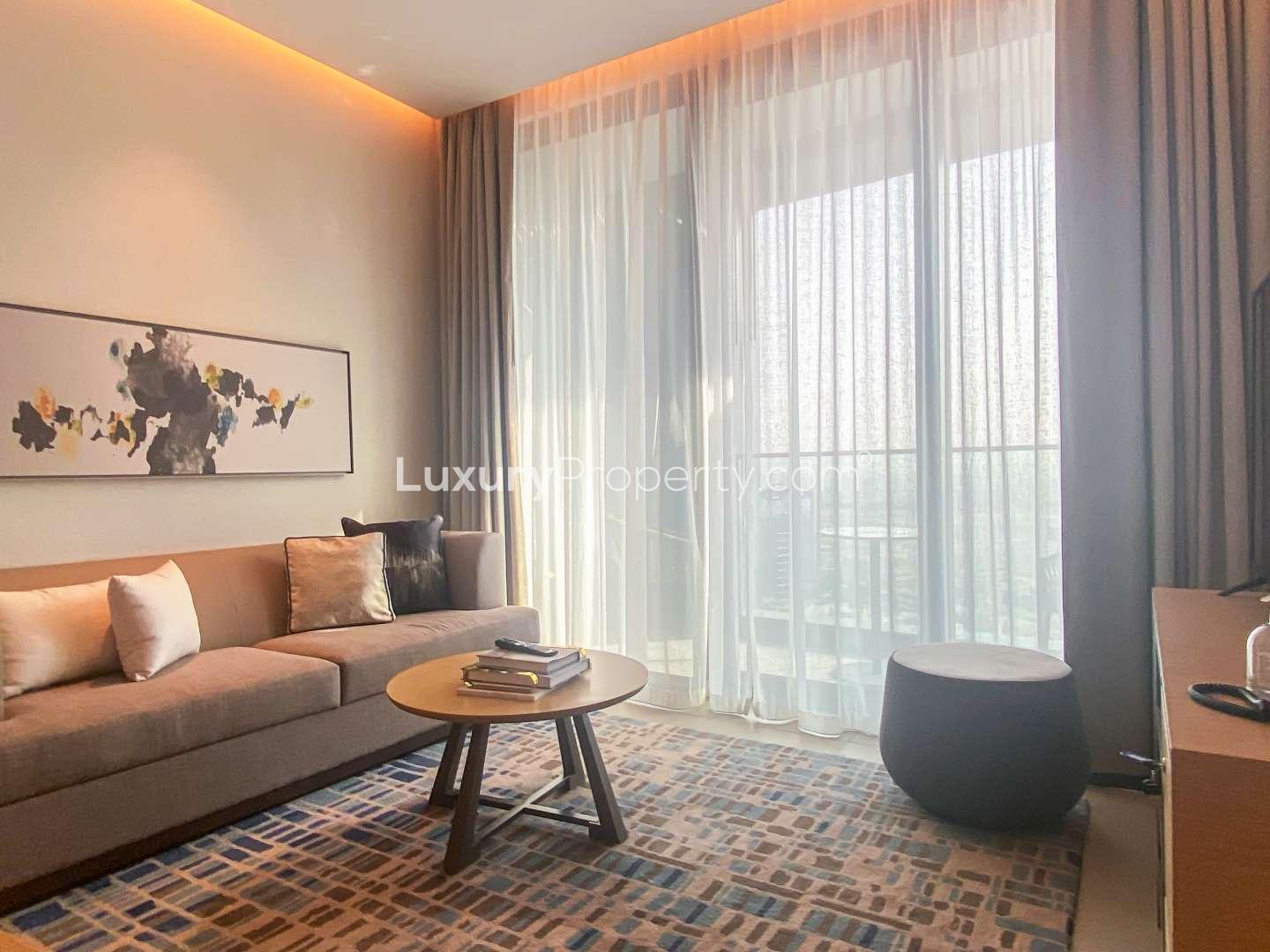 N/A,Modern living room in serviced two-bedroom apartment, Jumeirah Beach Residence, stylish decor, natural light