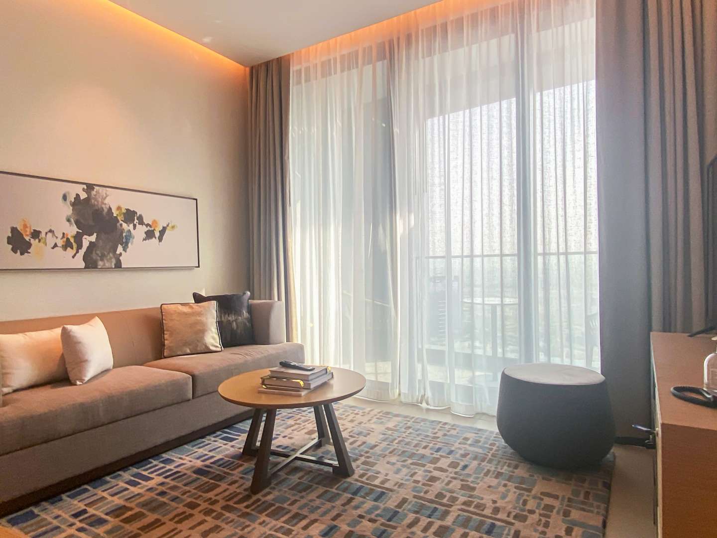 N/A,Modern living room in serviced two-bedroom apartment, Jumeirah Beach Residence, stylish decor, natural light