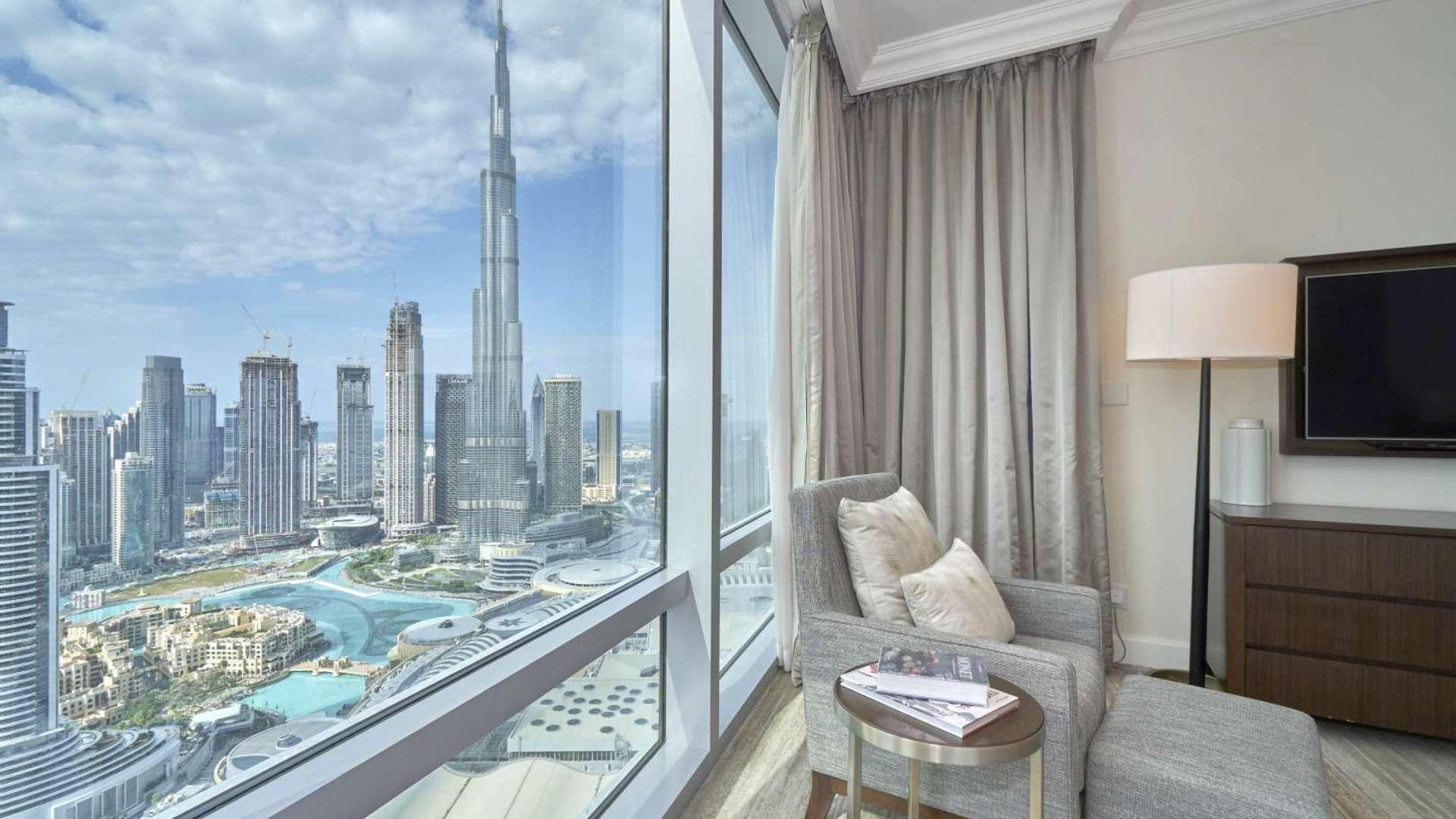 Furnished living room with city view in The Address Residence Fountain Views, Downtown Dubai apartment