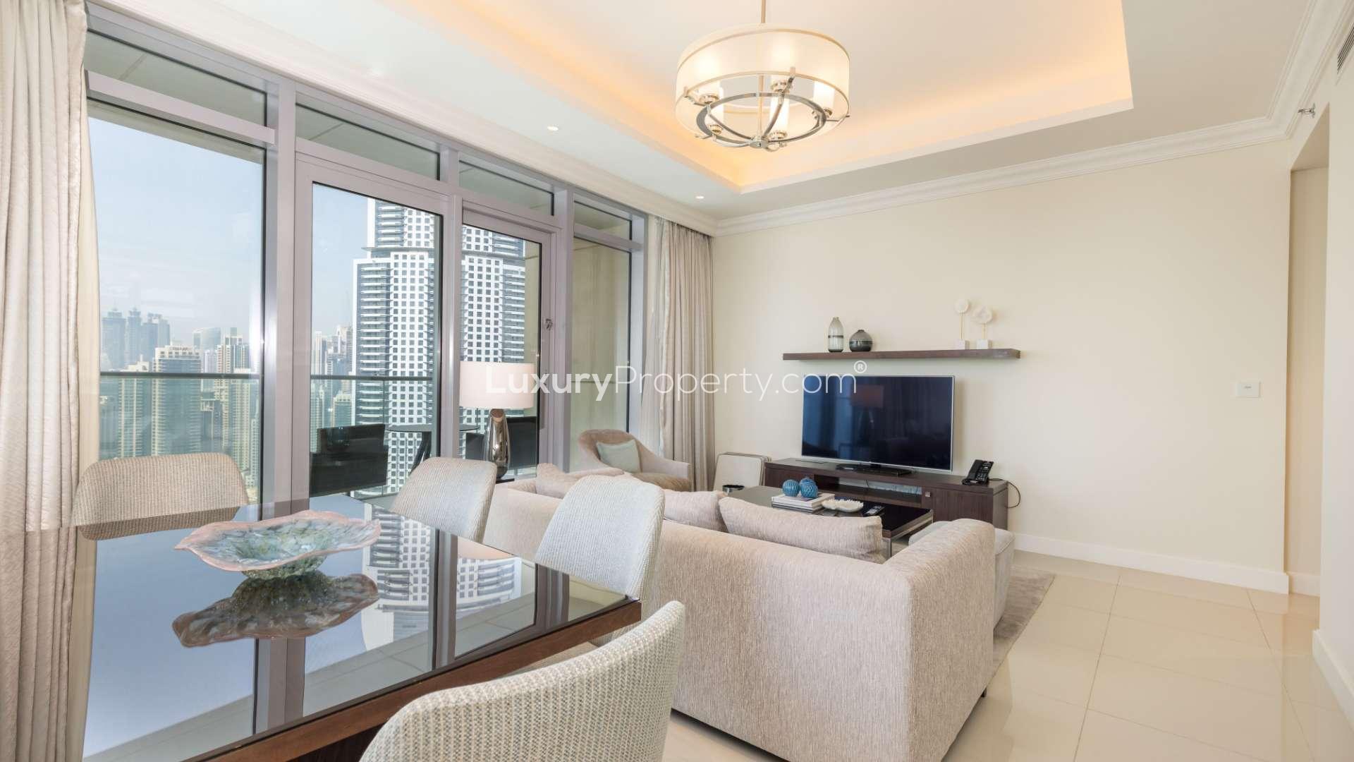 Furnished living room in Fountain Views apartment, Downtown Dubai, with modern decor and city view
