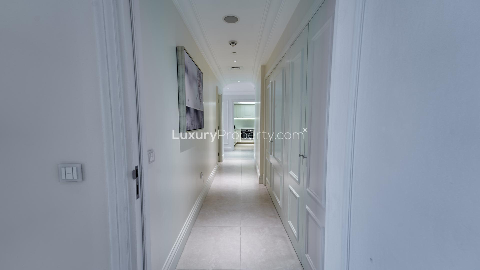 Fully furnished high-floor apartment interior with bedroom and dining area, Downtown Dubai