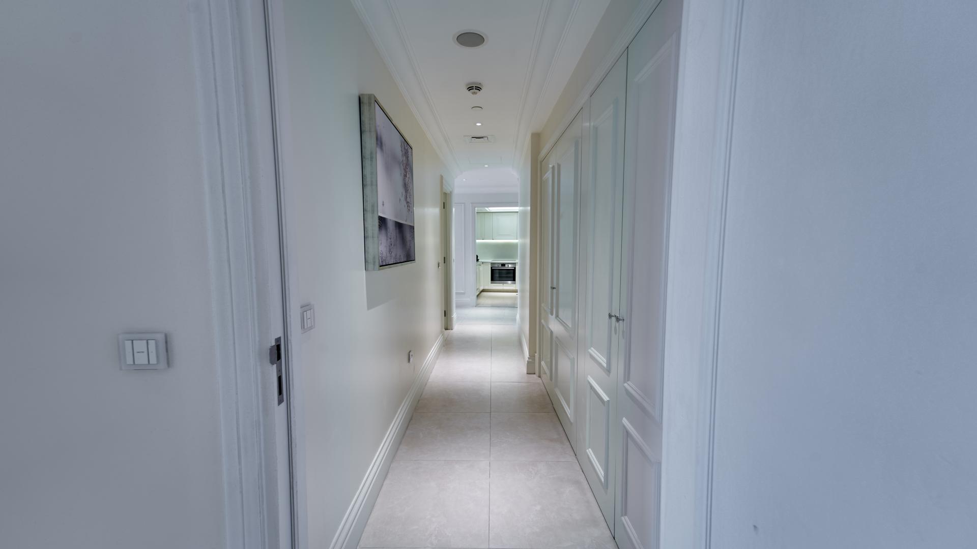 Fully furnished high-floor apartment interior with bedroom and dining area, Downtown Dubai