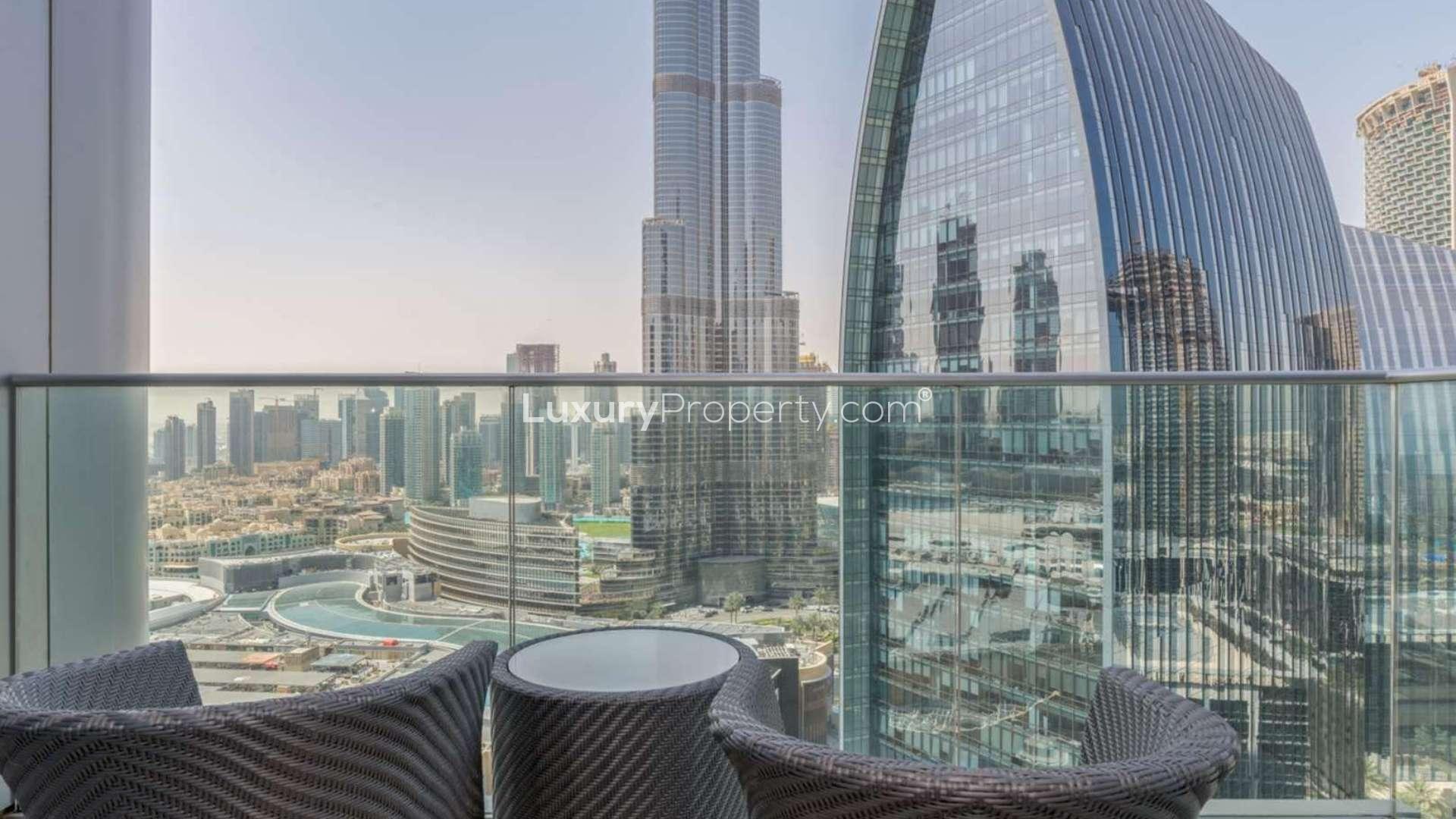Fully furnished living room in serviced apartment, Downtown Dubai, modern decor, city view