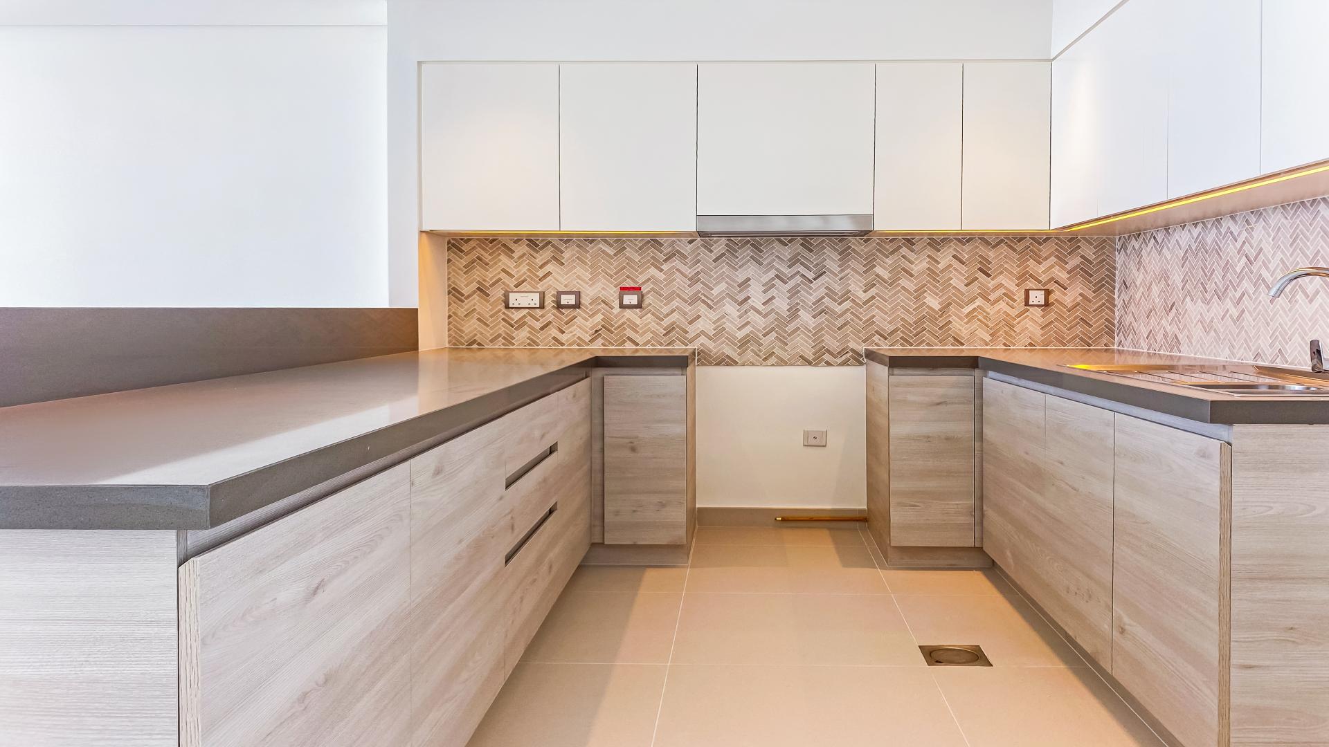 Modern kitchen in 2-bedroom apartment, The Cove 3, Dubai Creek Harbour, for rent