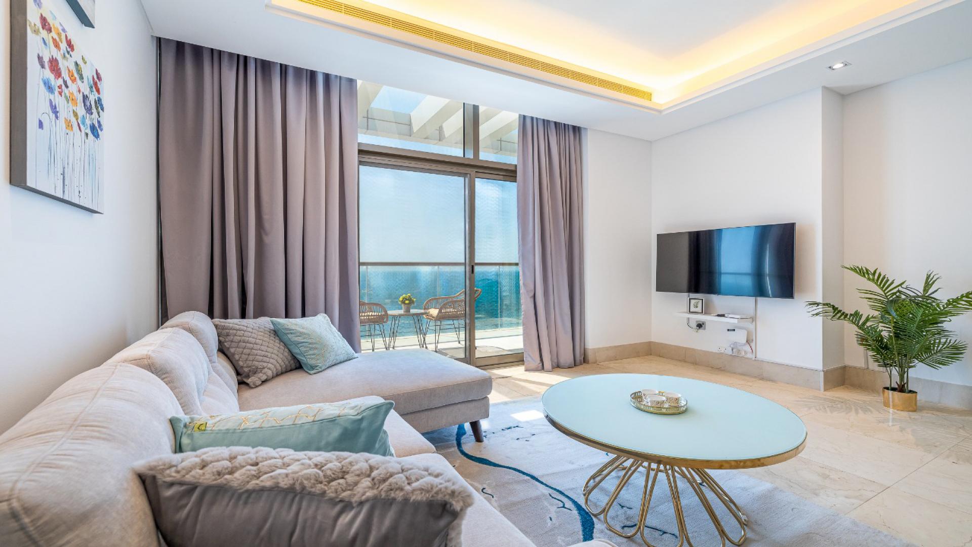 Beachfront apartment balcony with ocean view on Palm Crescent, Palm Jumeirah, Dubai