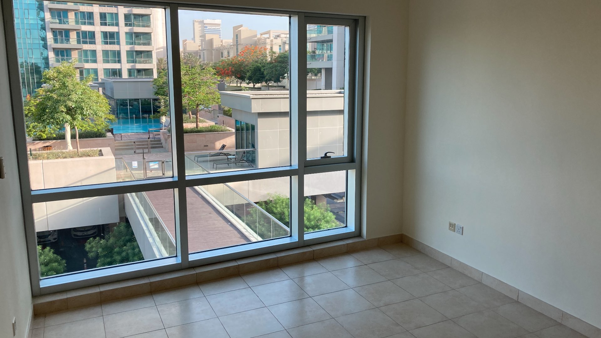 Aerial view of The Fairways apartment complex with pool and golf course in The Views