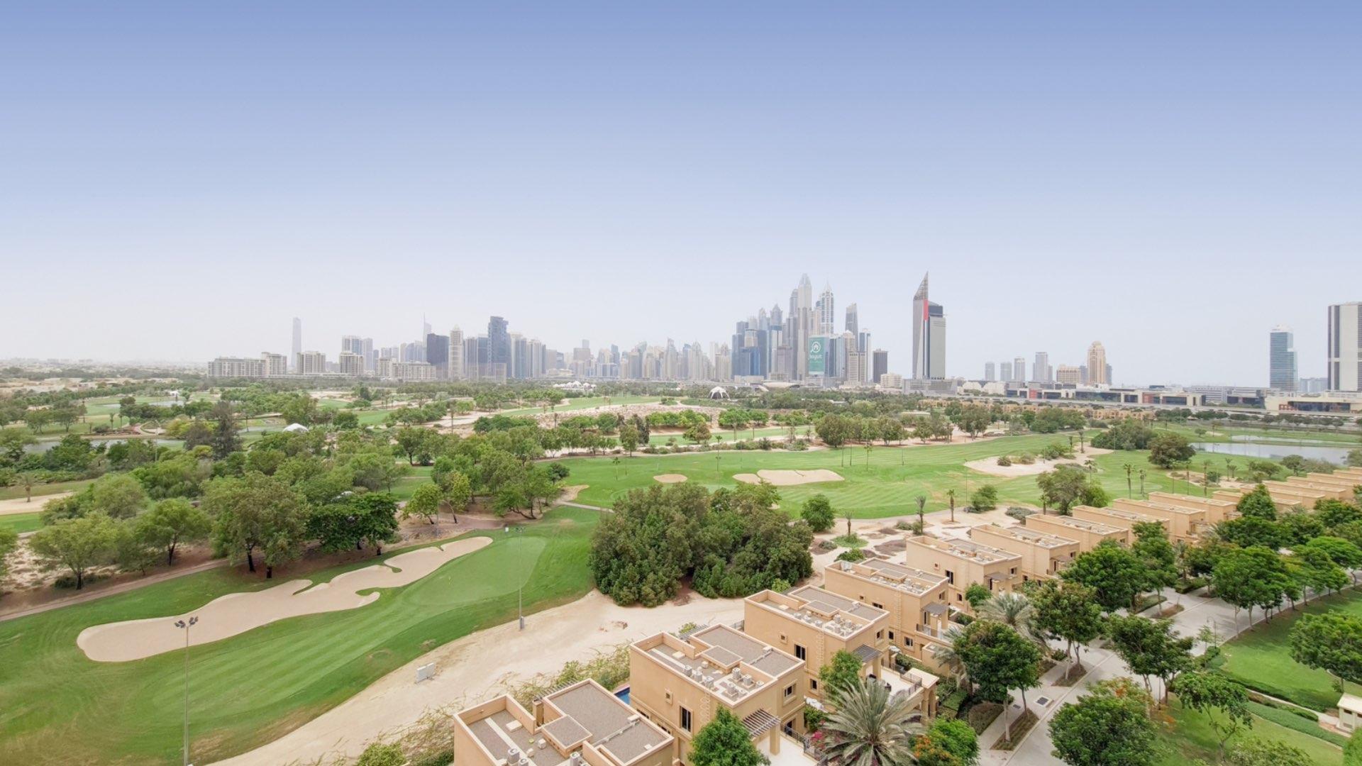 Modern living room with golf course views in The Fairways, 2-bedroom apartment for rent