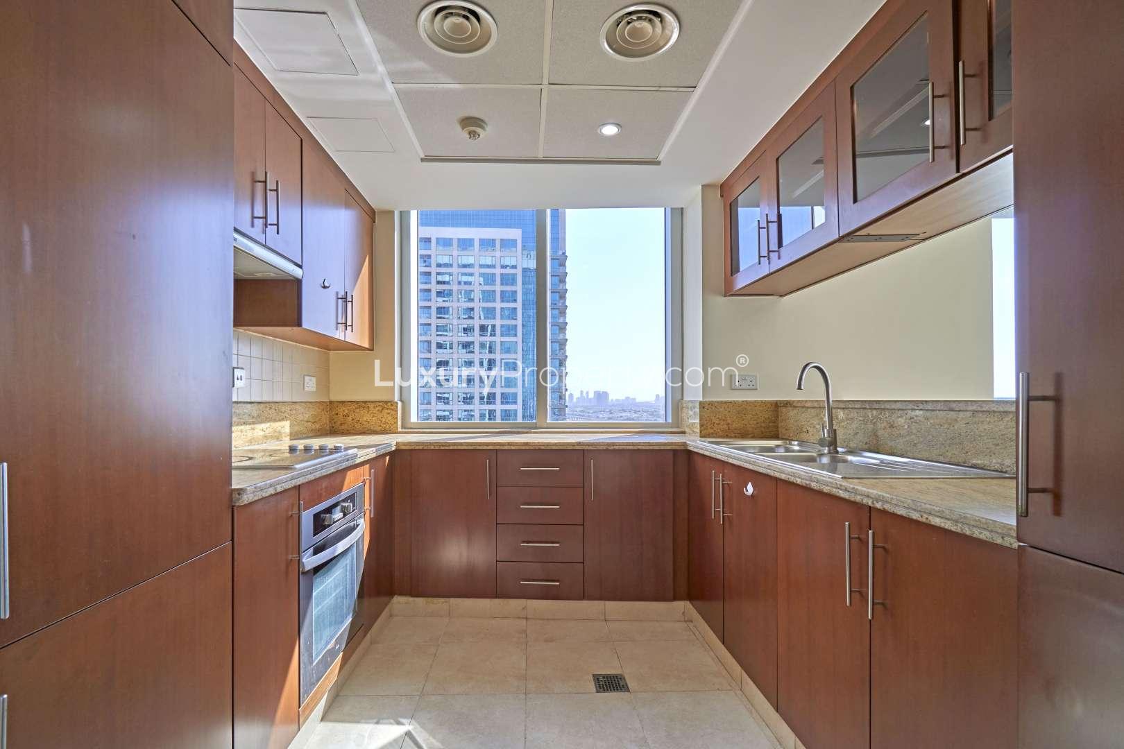 Bright, spacious living area in 2-bedroom apartment, Fairways North, The Views