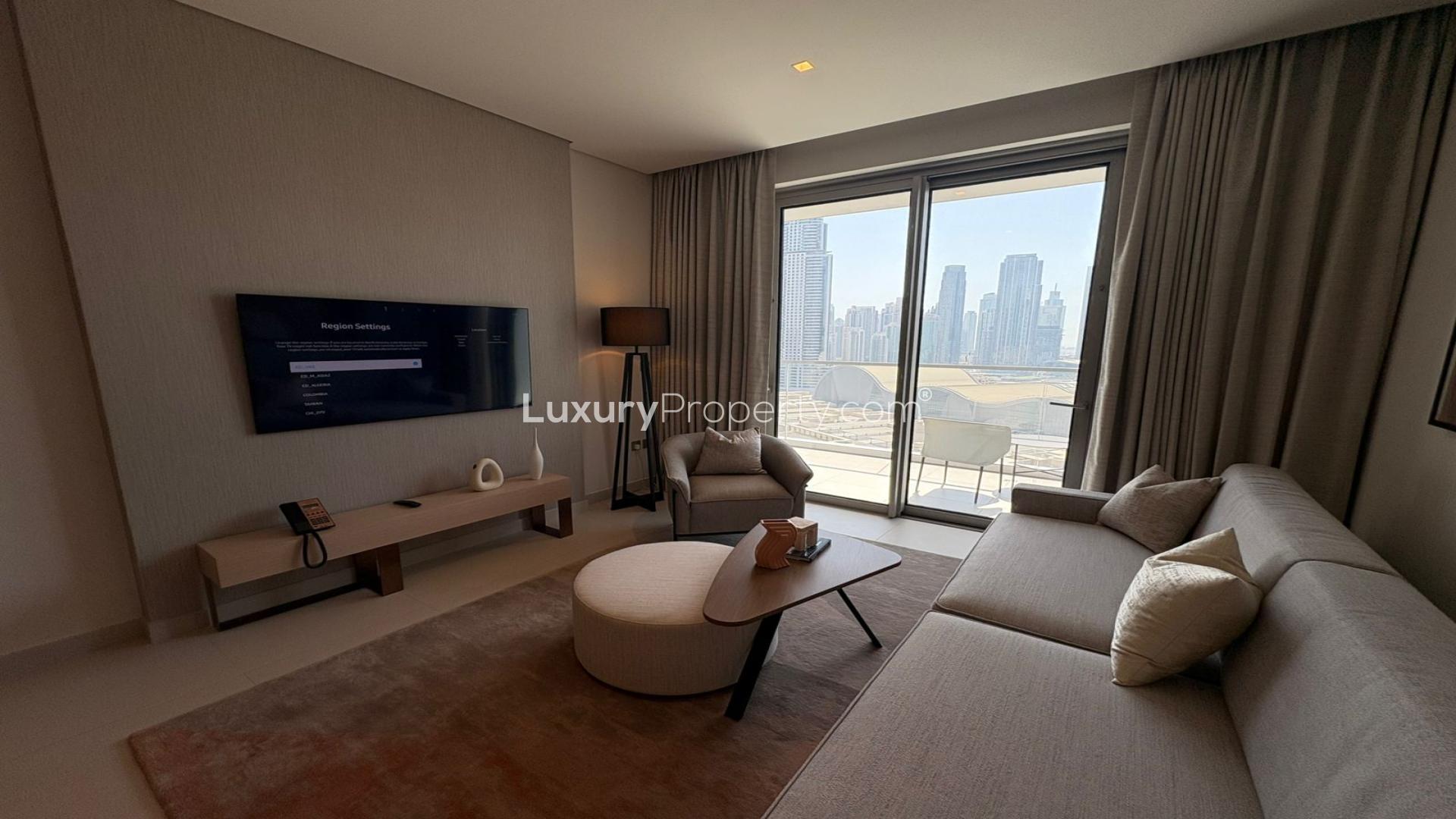 Fully furnished living room in Vida Dubai Mall apartment with city view, Downtown Dubai
