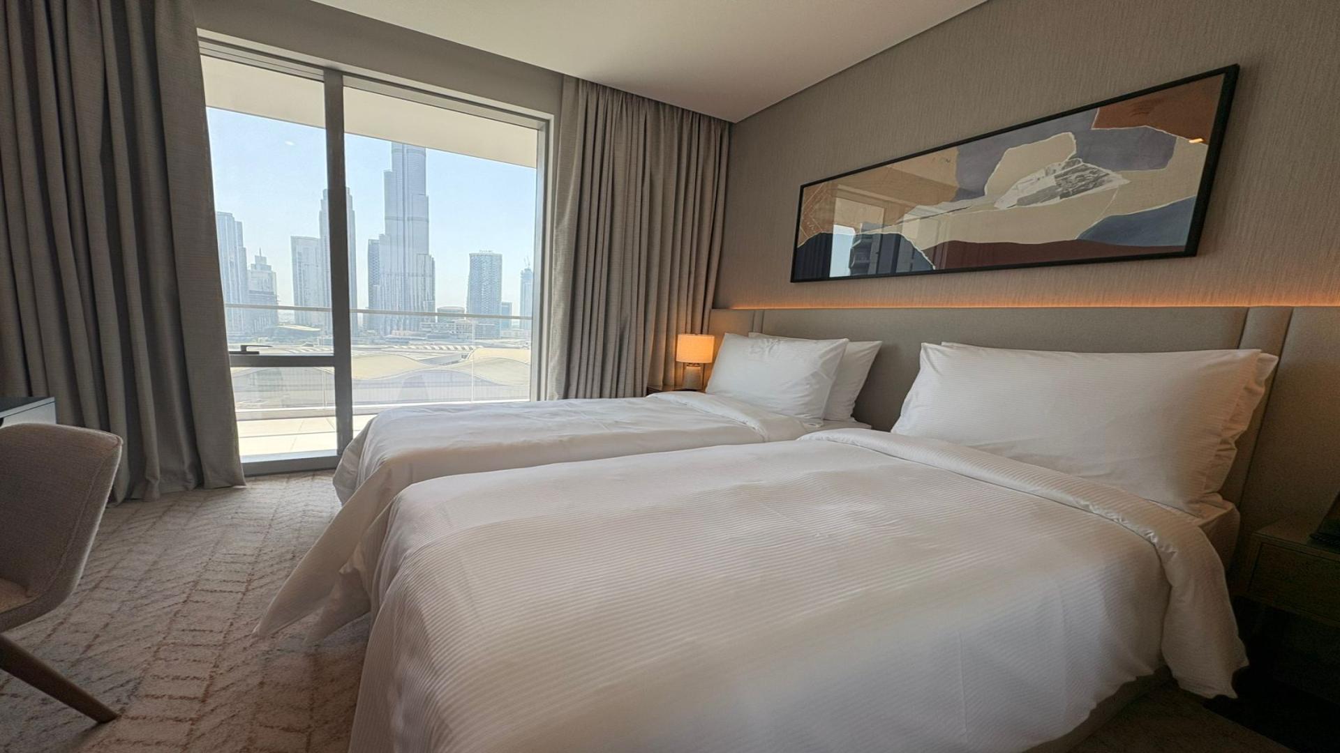 Fully furnished living room in Vida Dubai Mall apartment, Downtown Dubai, for rent