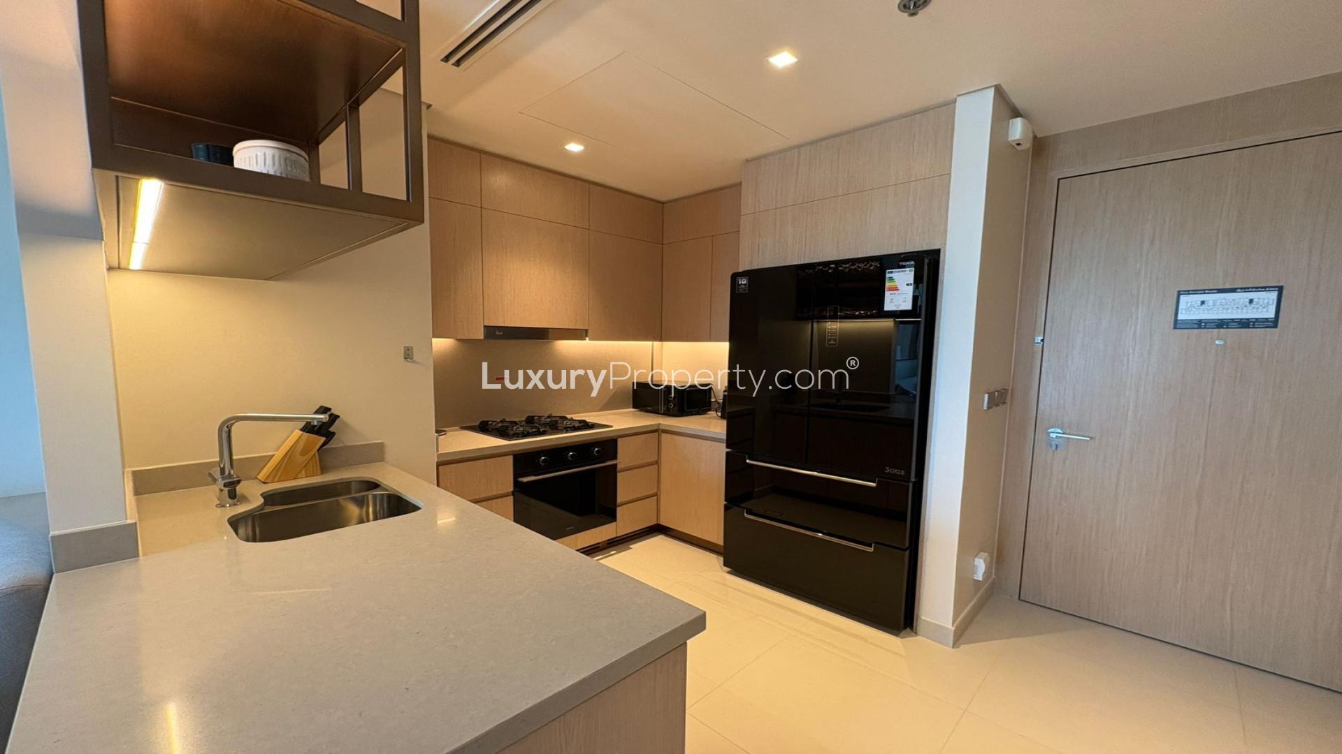 "Modern bedroom in fully furnished 2-bedroom apartment, Vida Dubai Mall, with city views.",Modern kitchen in fully furnished 2-bedroom apartment, Vida Dubai Mall, Downtown Dubai rental