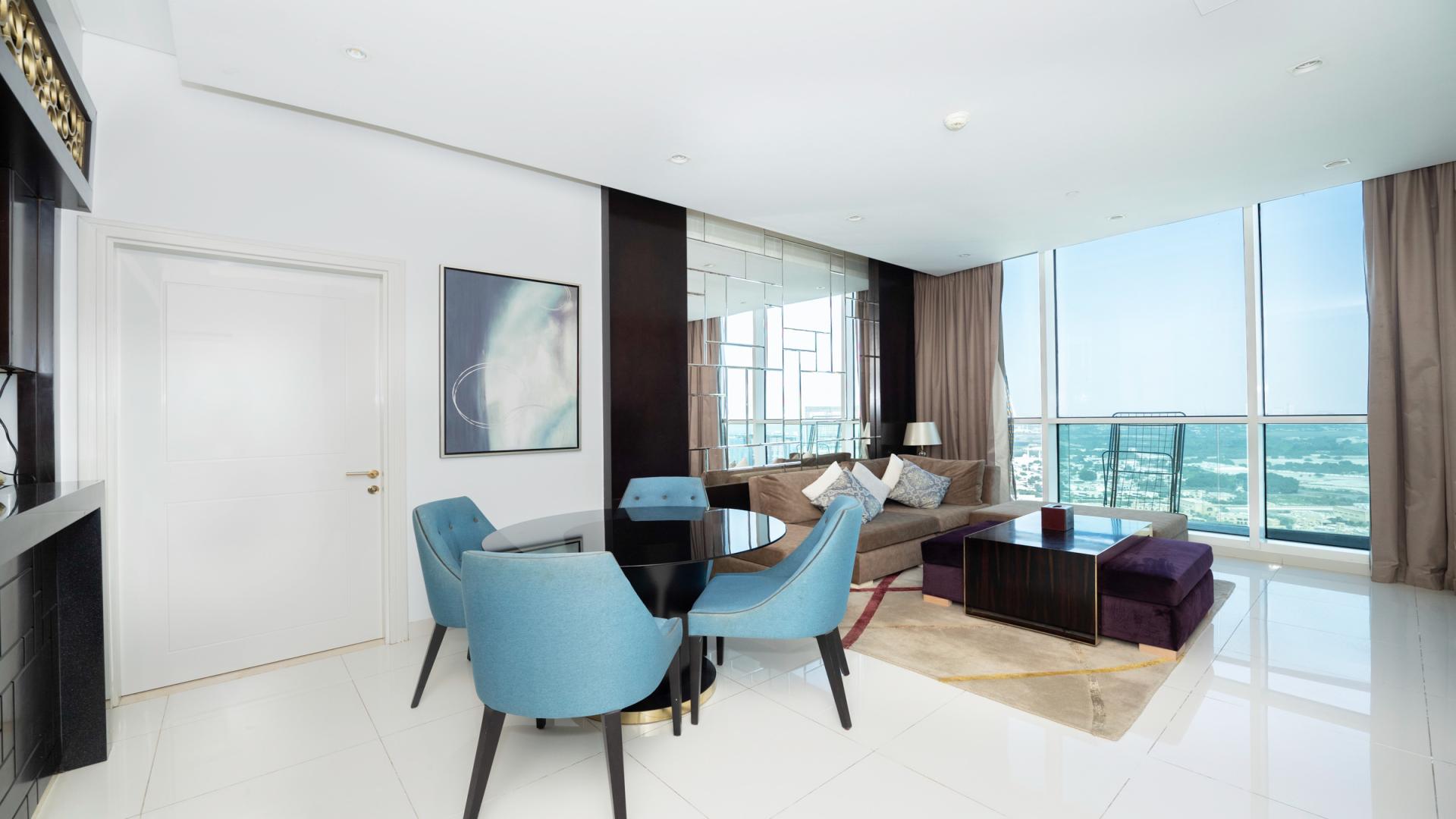 High-floor 2-bedroom apartment living area with modern decor in Upper Crest, Downtown Dubai