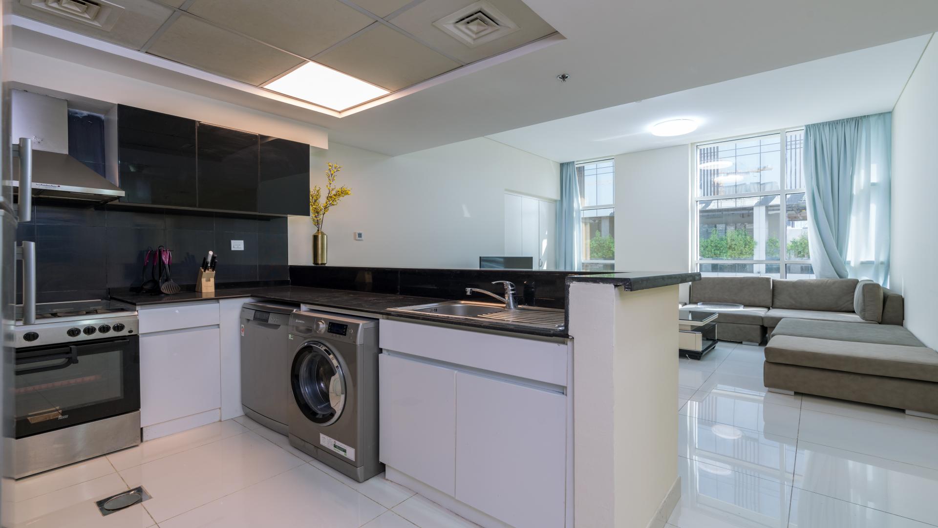 Luxurious 2-bedroom apartment living area with modern kitchen in Business Bay, Park Central