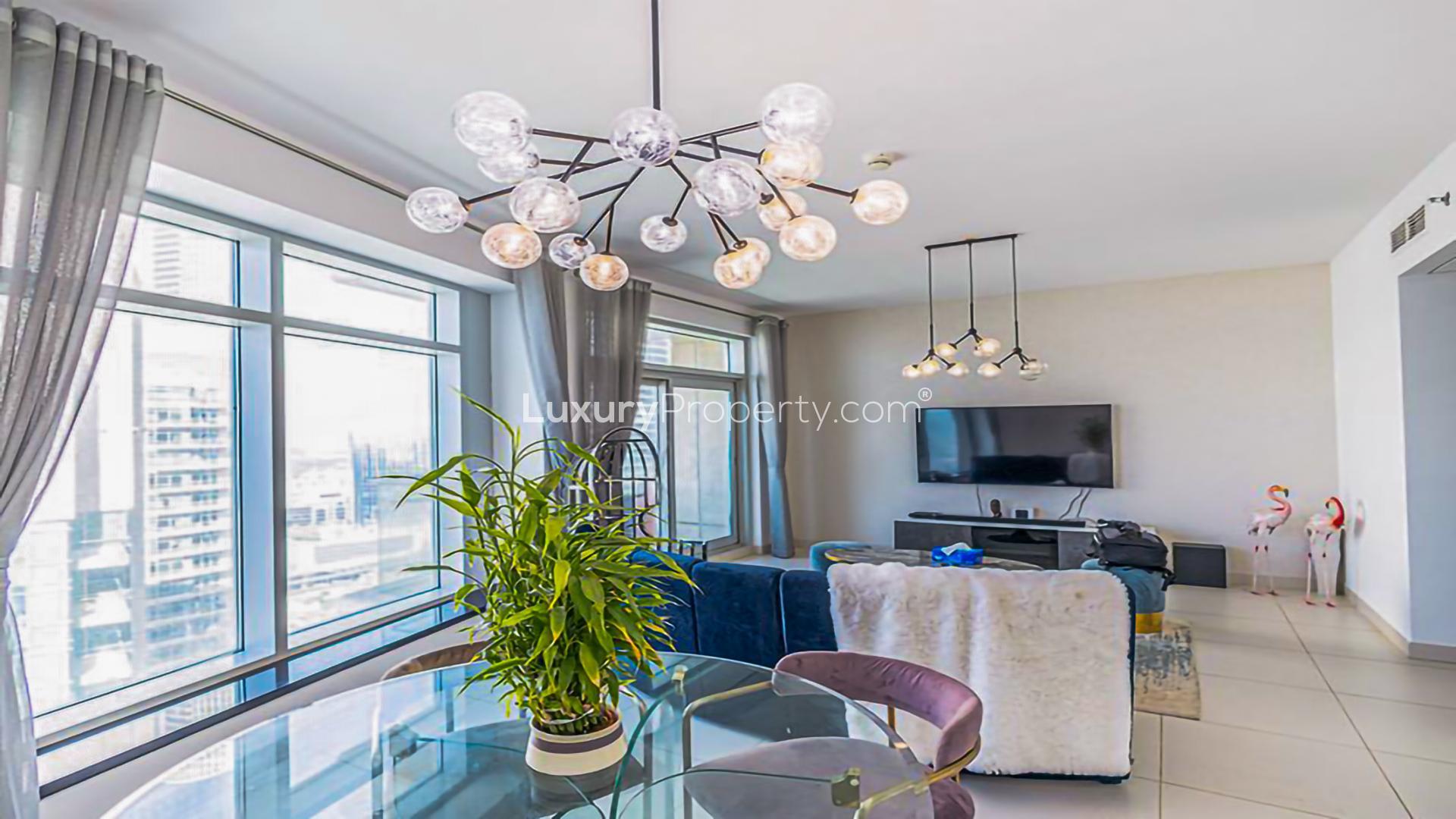 Elegant living room in 2-bedroom Downtown Dubai apartment with city views and modern decor