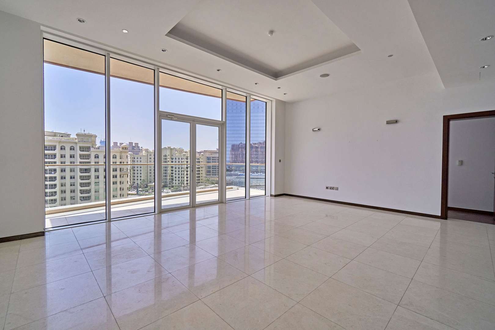 Empty bedroom with wooden flooring and built-in wardrobes in Tiara Residences, Palm Jumeirah