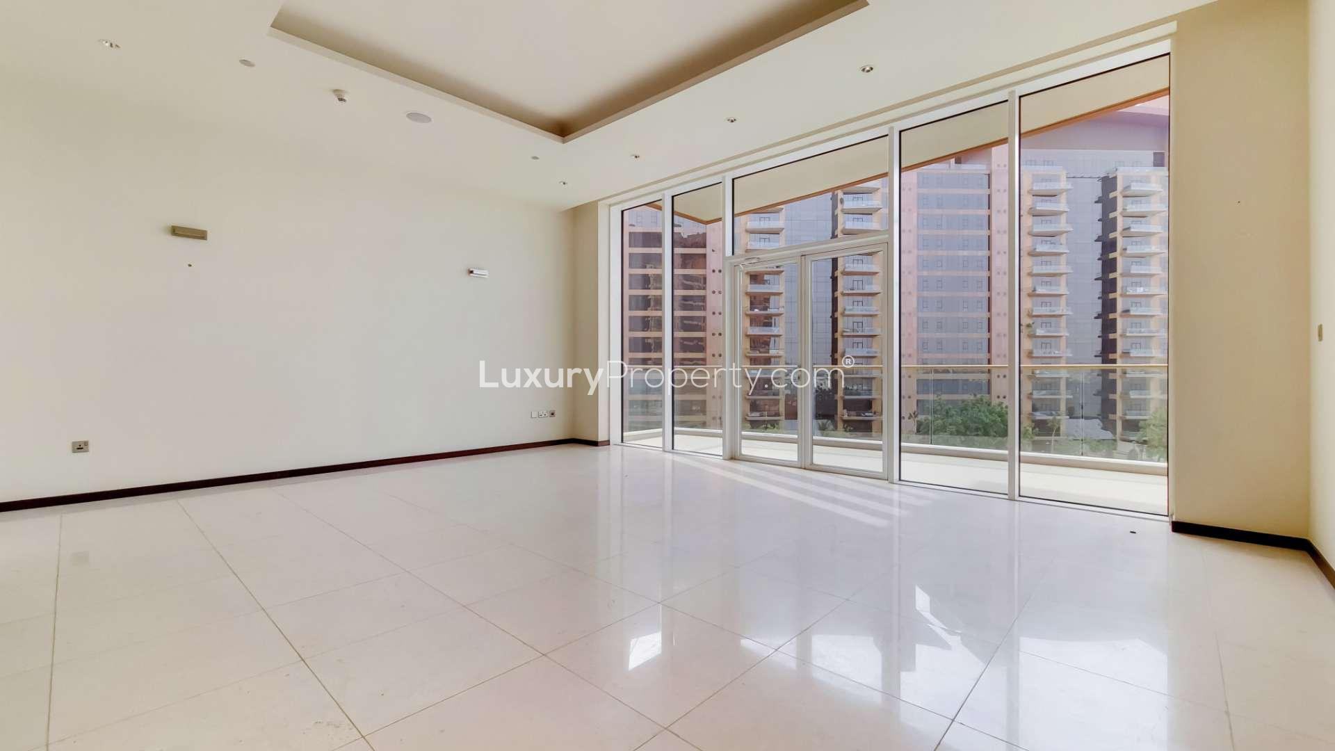 Balcony view of Tiara Residences apartment overlooking sea and pool, Palm Jumeirah