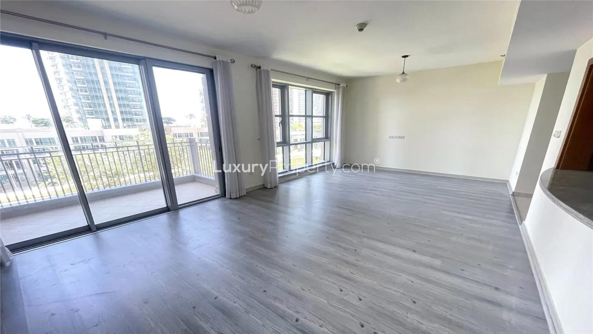 Empty modern apartment interior with wood flooring in Standpoint Towers, Downtown Dubai