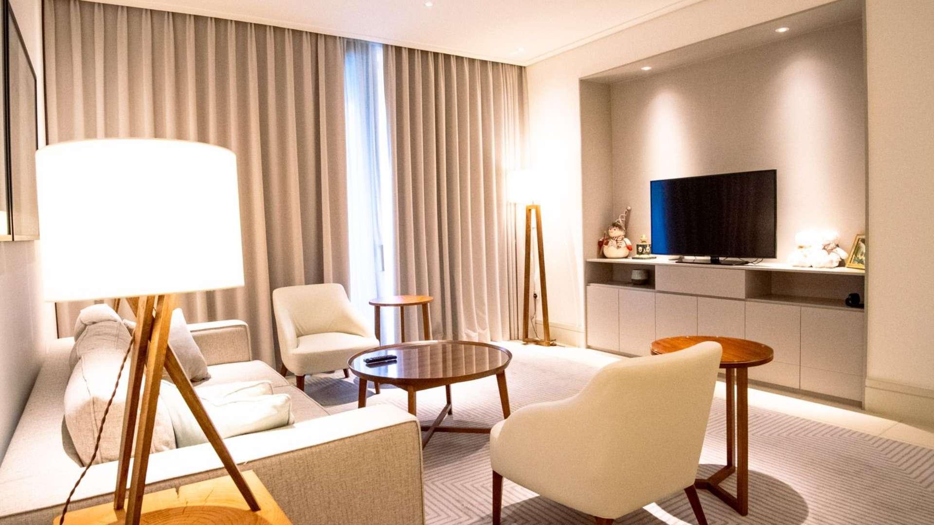 Apartment balcony view of Burj Khalifa and Downtown Dubai skyline from Vida Residence